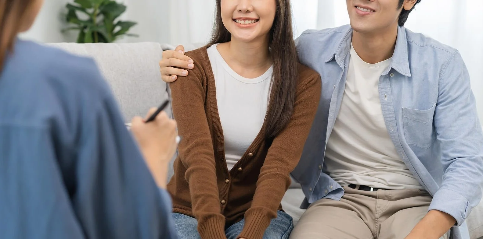 A couple sitting together in a therapy session