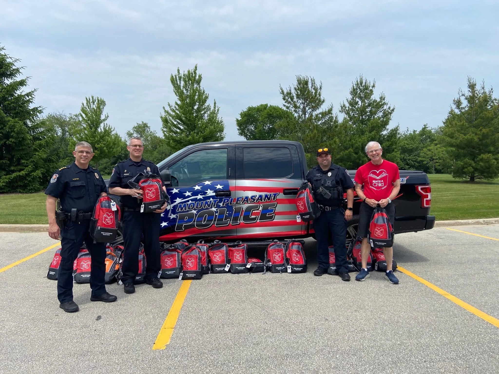 REACH-A-Child Delivers REACH BAGs to the Mount Pleasant Police Department