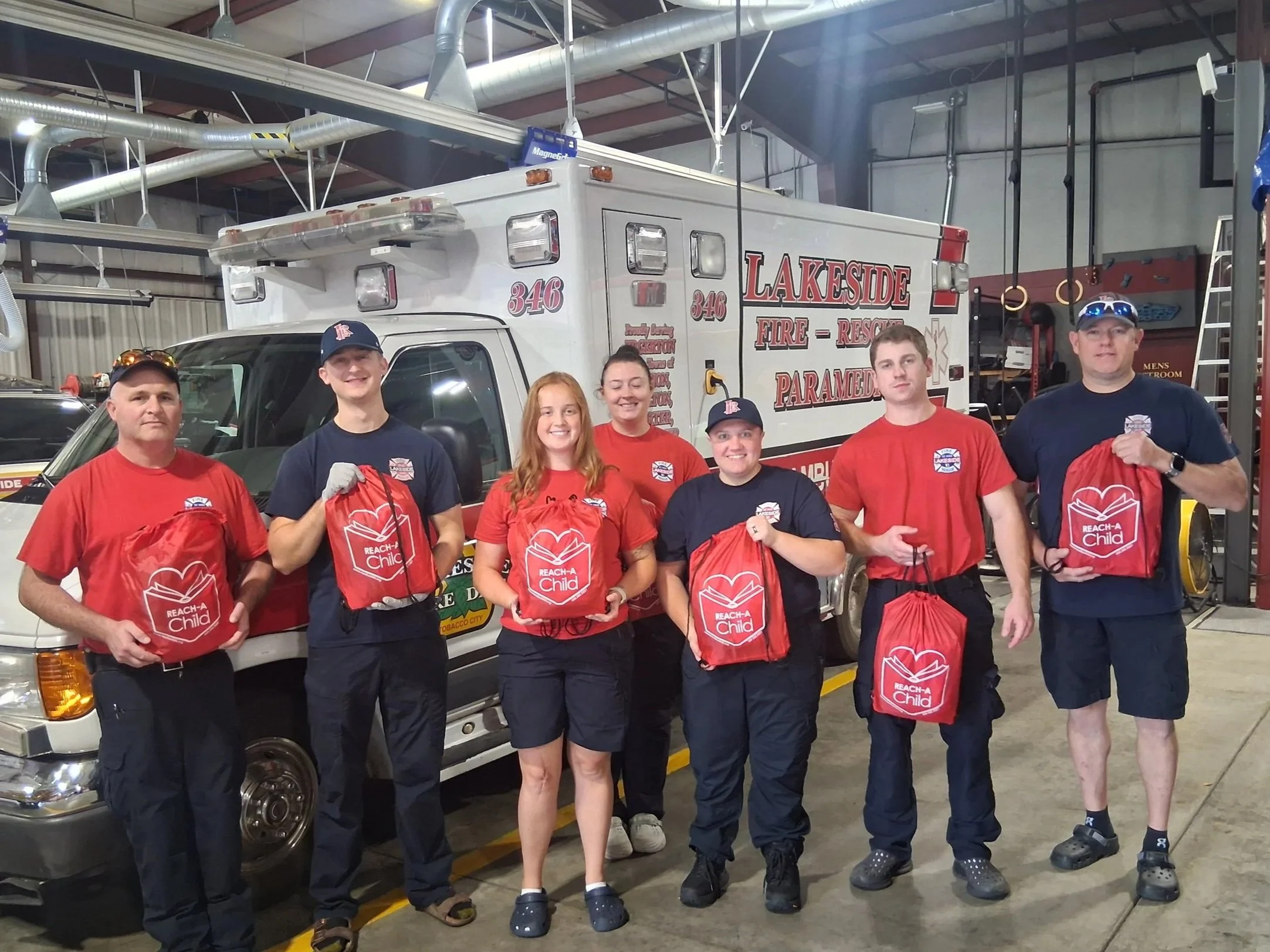 REACH-A-Child delivers 13 REACH Bag refills to the Lakeside Fire District in Edgerton