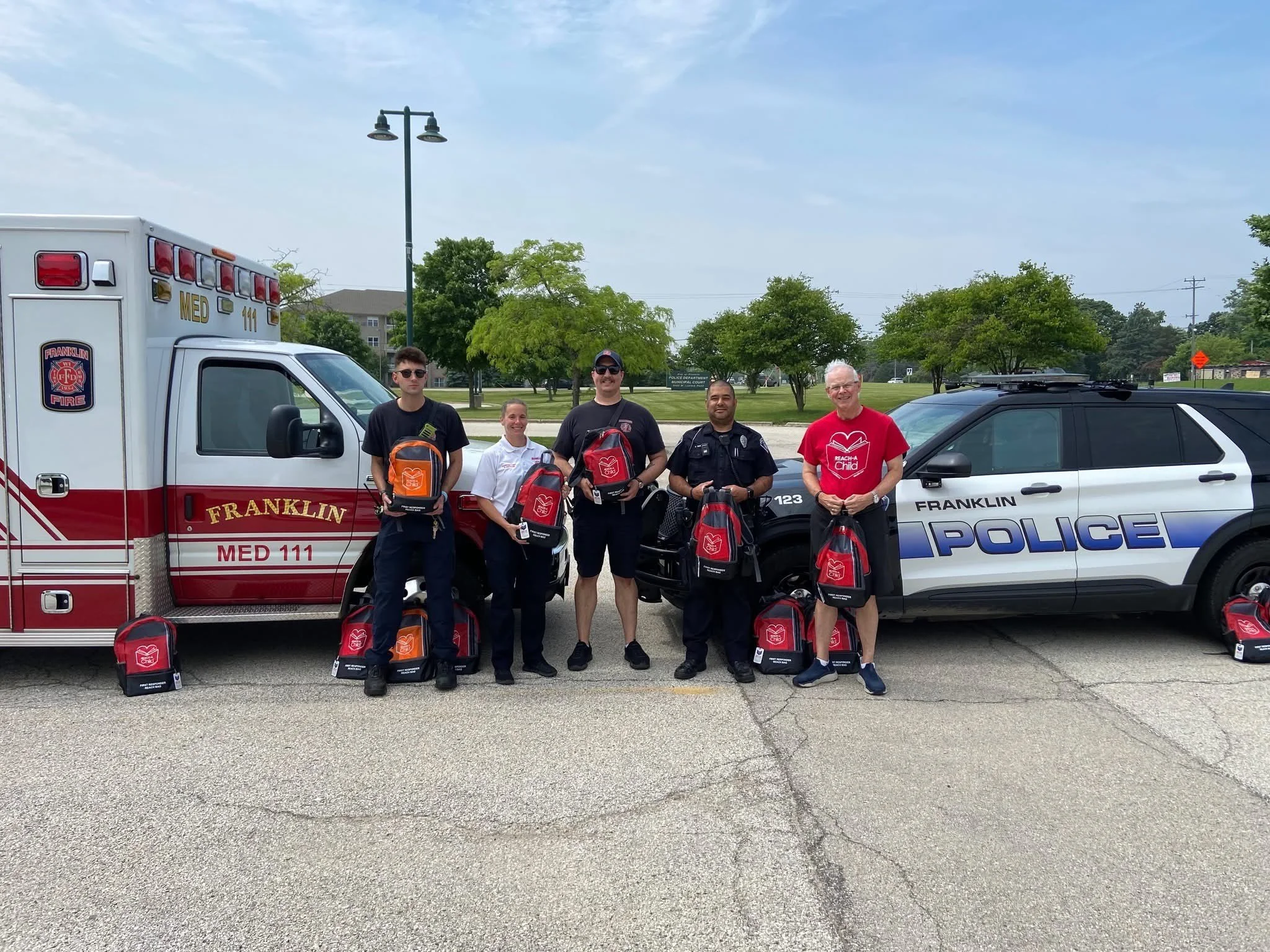 REACH-A-Child Delivers REACH BAGs to the Franklin Police Department and Franklin Fire Department