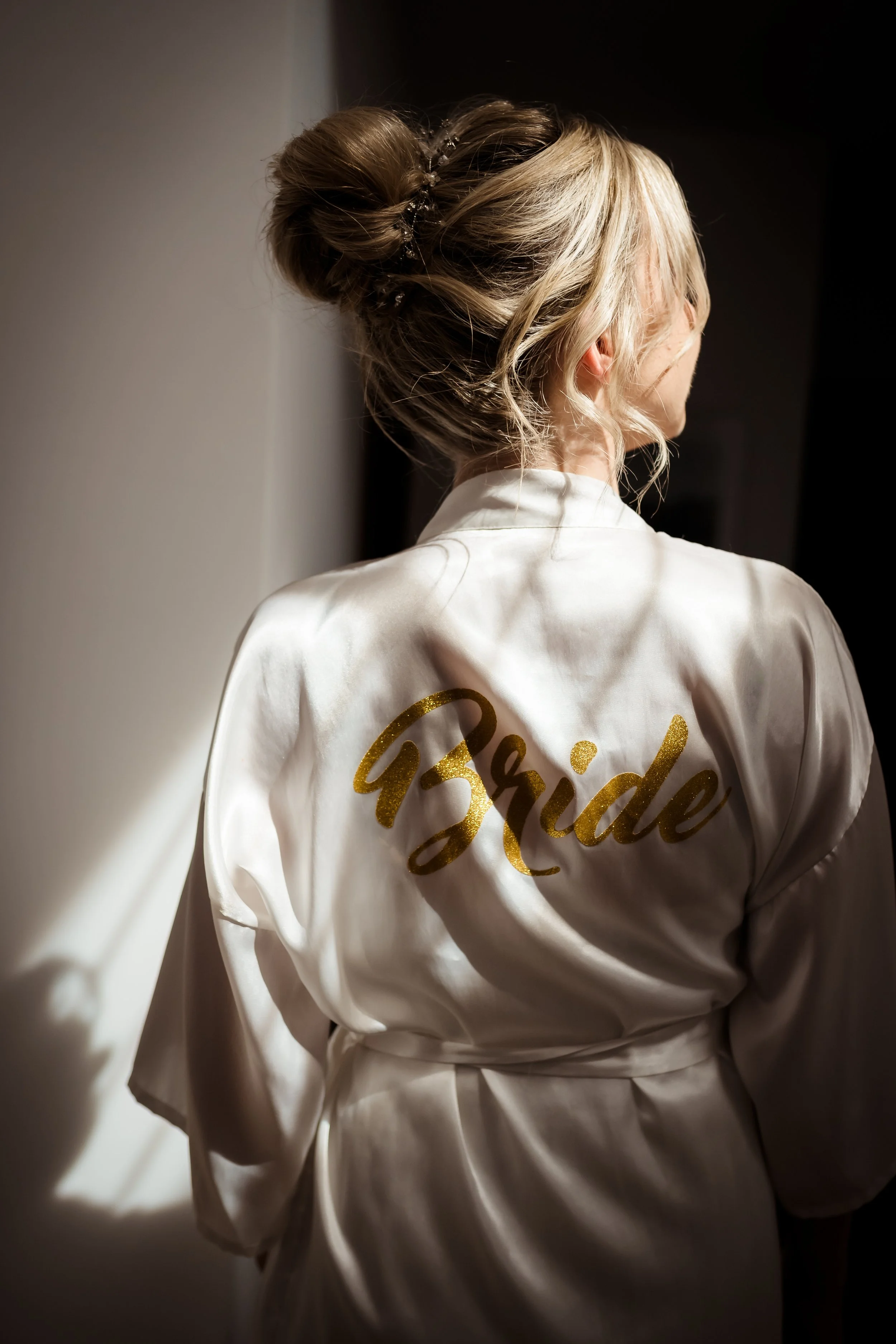 recogido novia moño alto