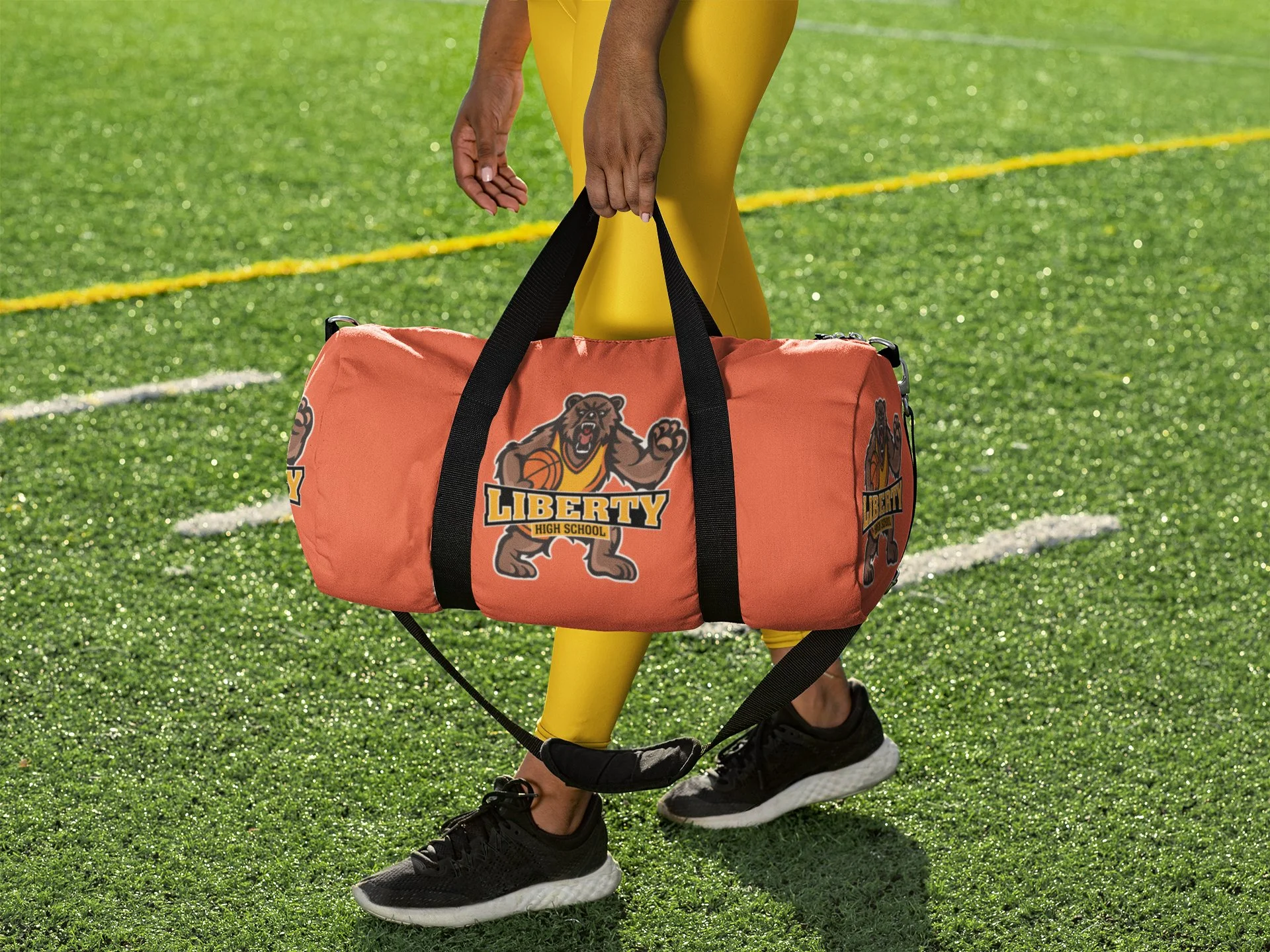duffle-bag-mockup-featuring-a-woman-at-a-soccer-field-31353 (1).jpg