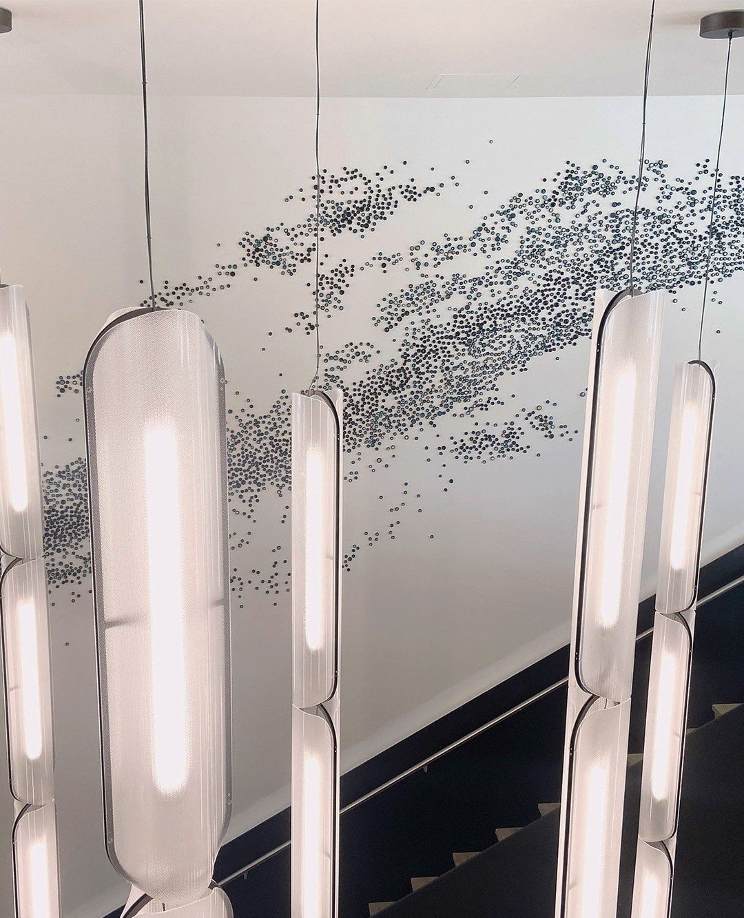 One of our favorite artists, @paulfleming5145 completed this stunning installation at our Elevate project in Cambridge, MA in late 2023. Paul&rsquo;s work continues to impress us as he constantly evolves his one of a kind practice. His work is both g