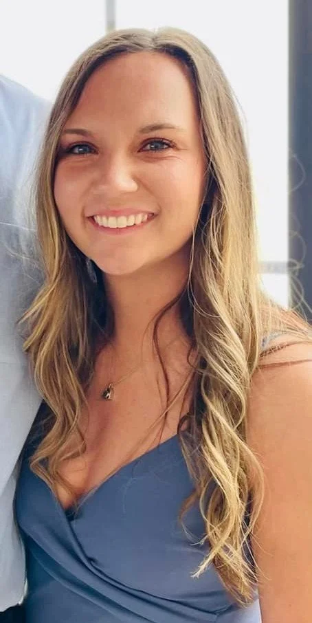 Close up photo of Breanna Affalter, LMSW, she has long blonde ahir and is smiling