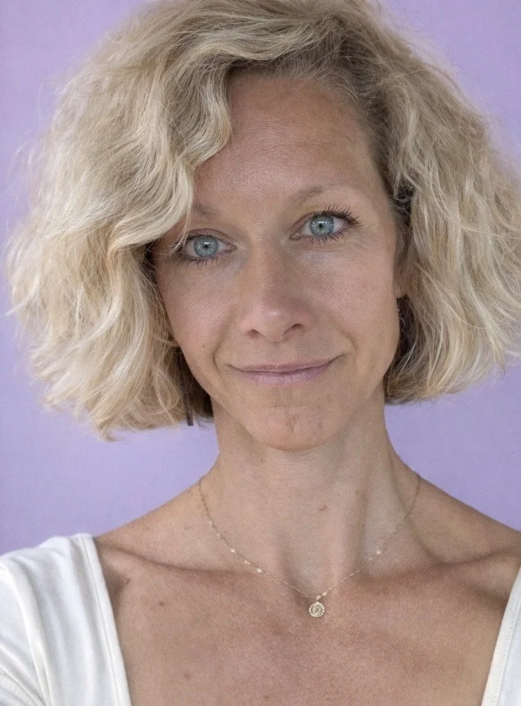 Head and shoulders photo of Brigid Dunn, LMSW. She has short blond hair, light blue eyes, and a small smile on her face.