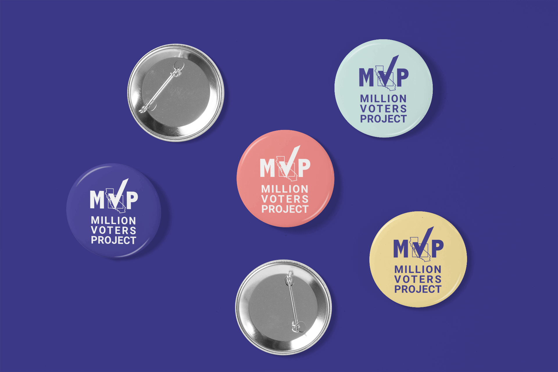  Four pins bearing the MVP logo with different colored backgrounds 