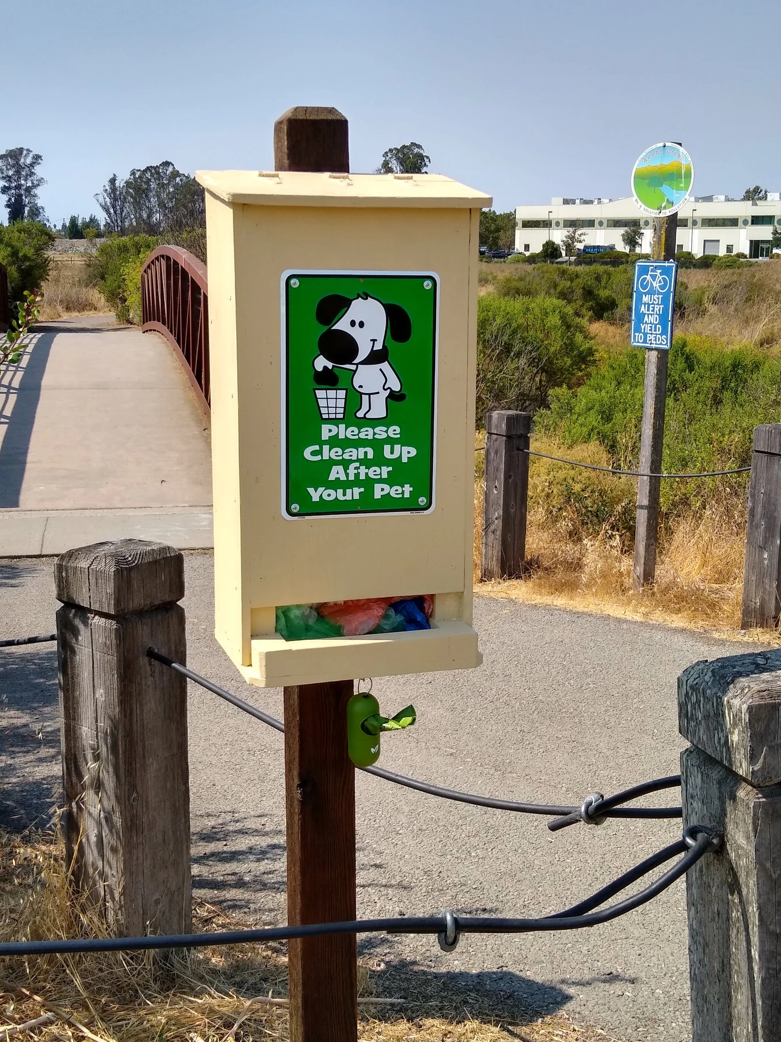 I rebuilt and painted doggie bag box by bridge over Adobe Creek.  A PWA volunteer team resupplies regularly. 