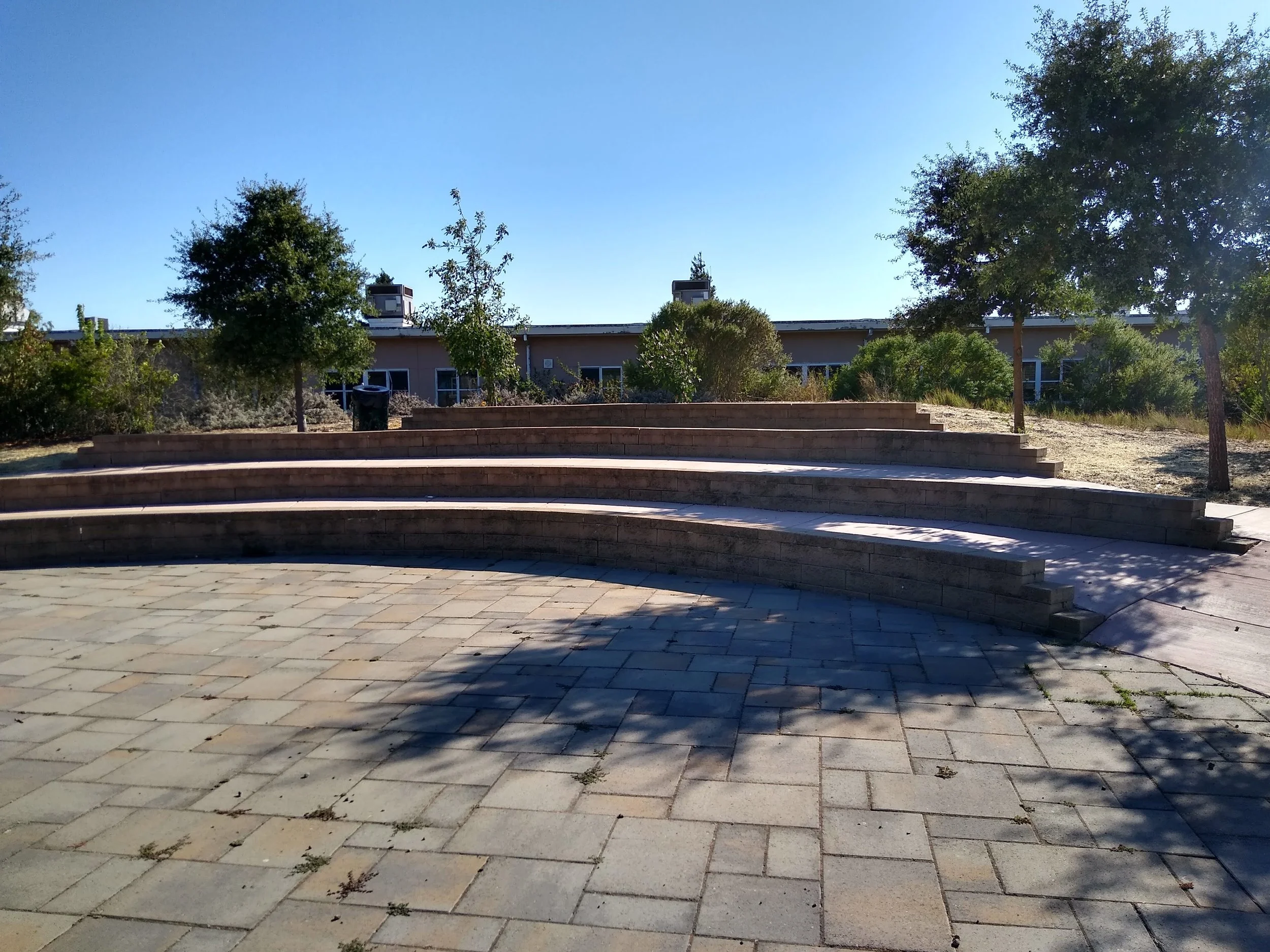 Current OLE Amphitheater with native tree shade. 