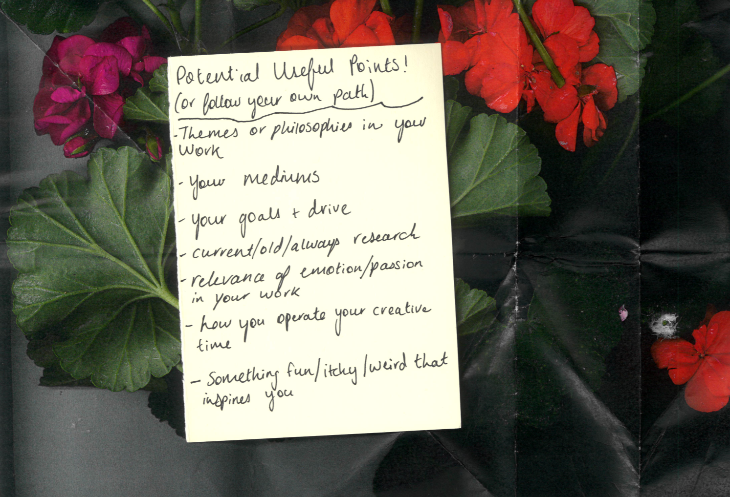 A handwritten note on top of an image of green leaves and vibrant red and pink geranium flowers. The note contains a handwritten list titled Potential Useful Points! (or follow your own path)