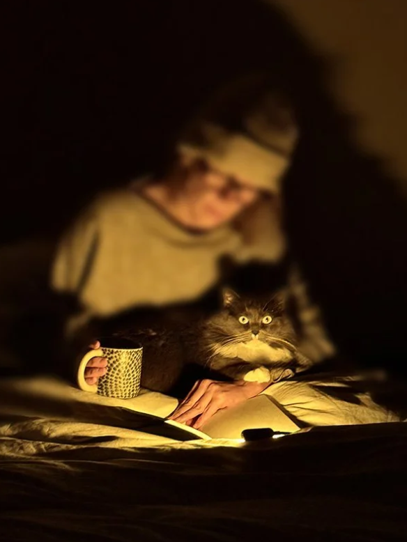 Luna and Cheyenne reading, luna's eyes are bright