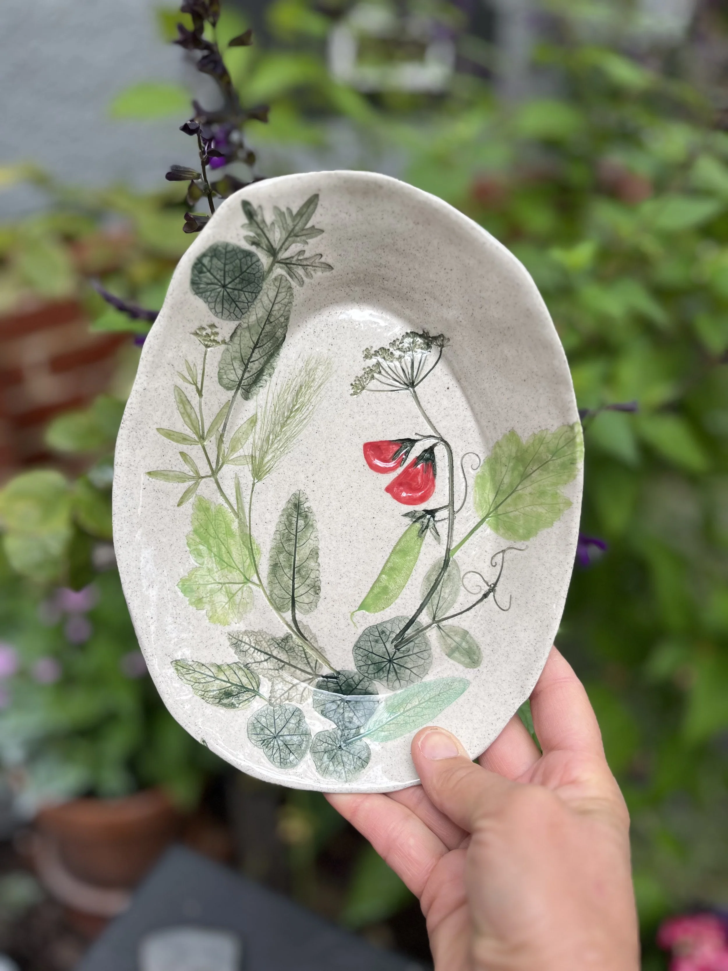 Egg-shaped oval sweet pea garden platter