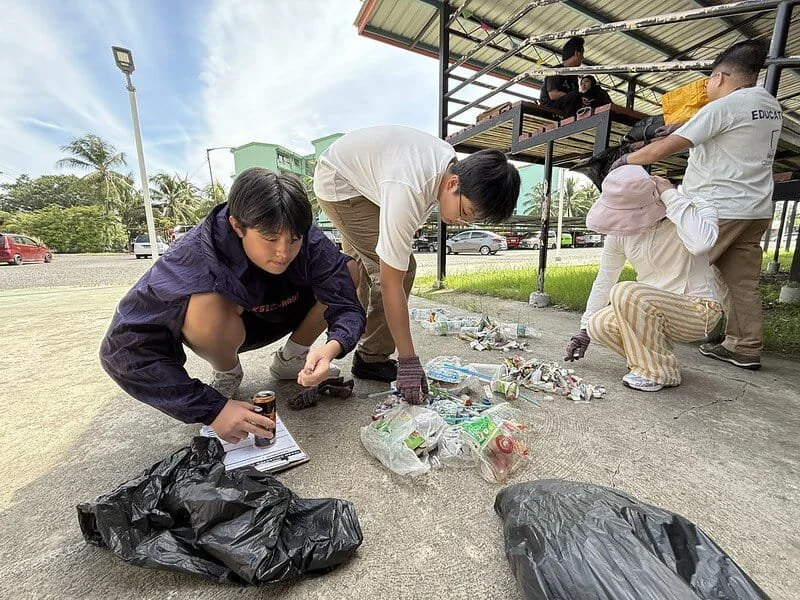 Students learning about the importance of recycling and sustainability.