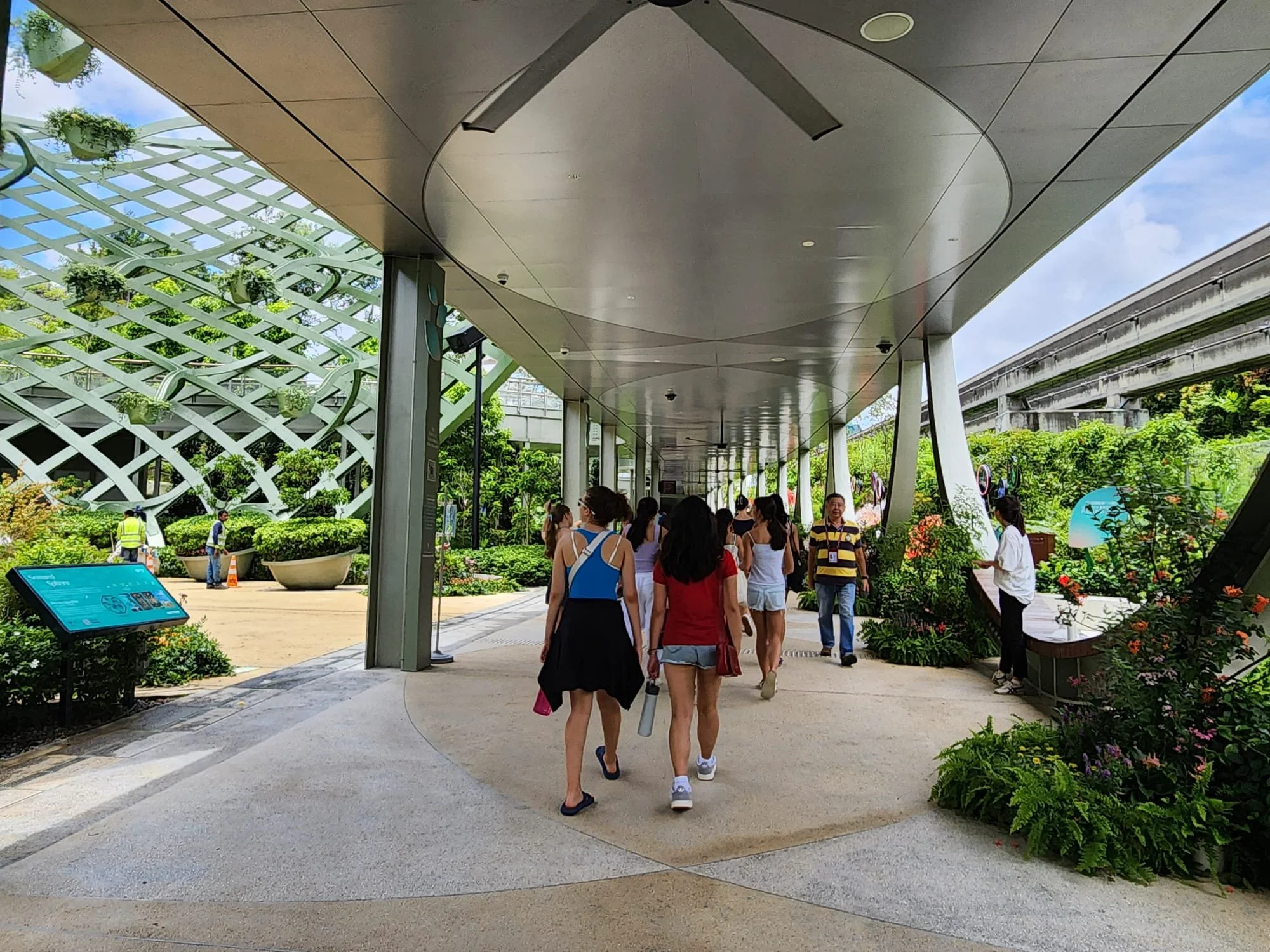 Students learning about modern urban culture in Singapore during an educational travel program.
