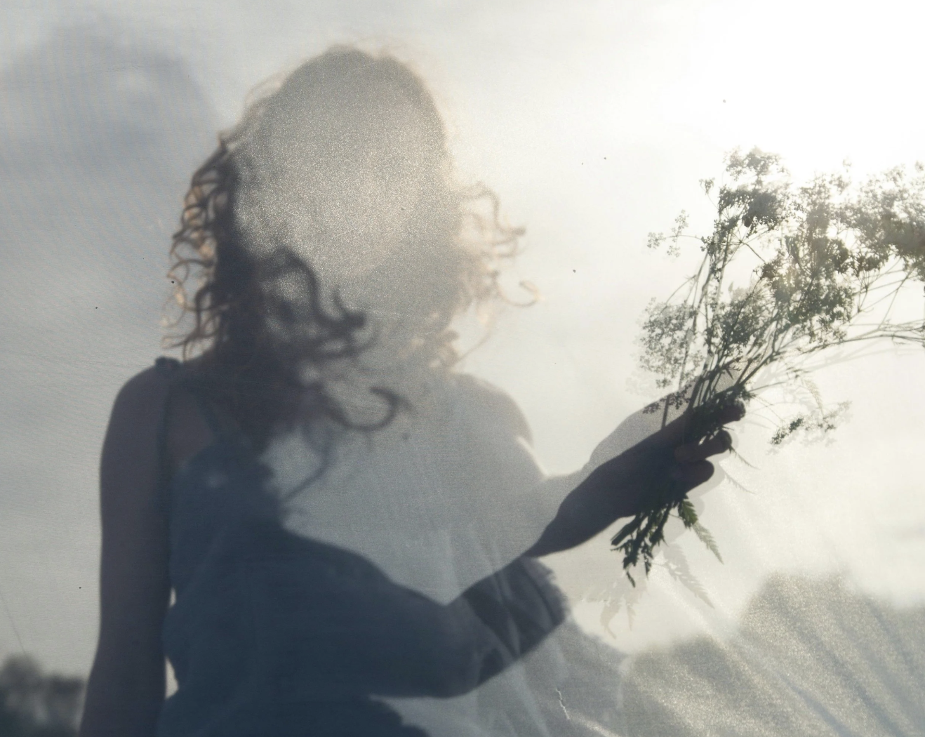 THE DIVINE REBIRTH THROUGH GRIEF: A PORTAL INTO THE FEMININE SOUL