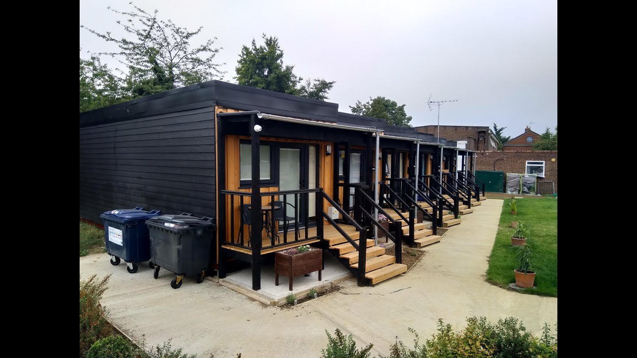 The modular homes completed, with their shared garden space which encourages neighbourliness,