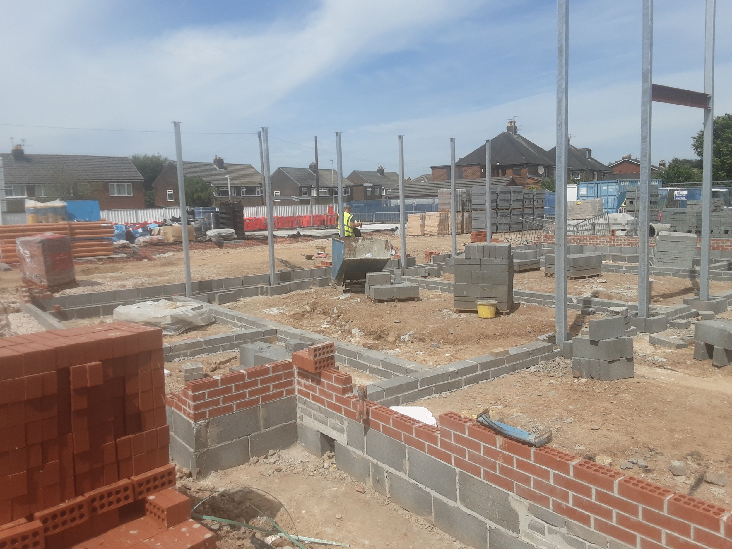 Footings going down and frames going up
