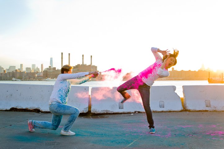 Alice &amp; Catie play with pink Holi powder at sunset along the river in Brooklyn, NY