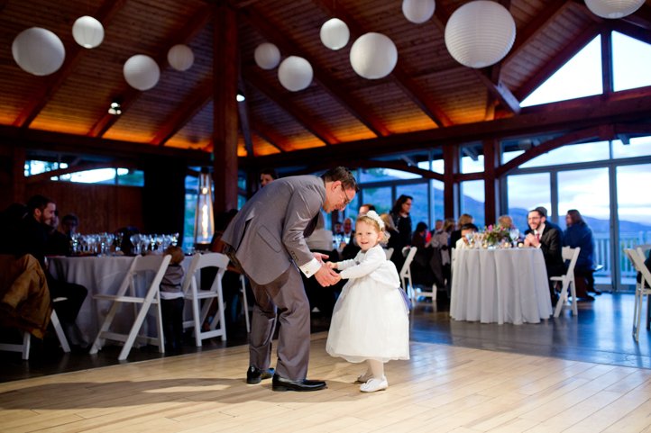 Father and child on the dance floor at the wedding reception