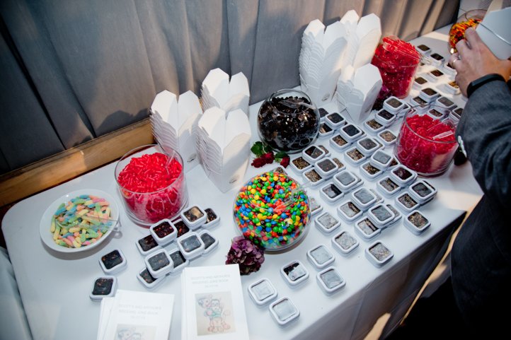Table with candy on it and take out boxes