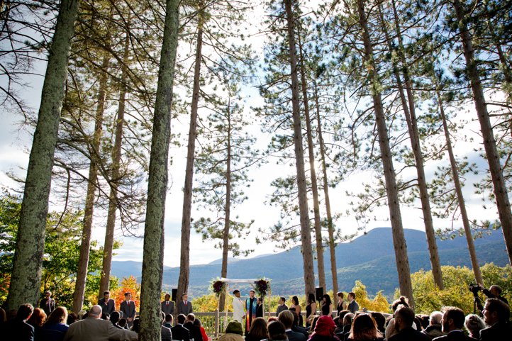 Wide shot of ceremony amongst the pine trees in the Catskills