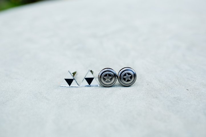 The couples' Triforce and Captain America cuff links