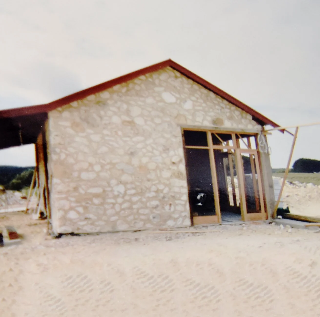The original Cape Jaffa Wines cellar door under construction; built by hand using limestone rock from the surrounding paddocks of the Limestone Coast near Robe.