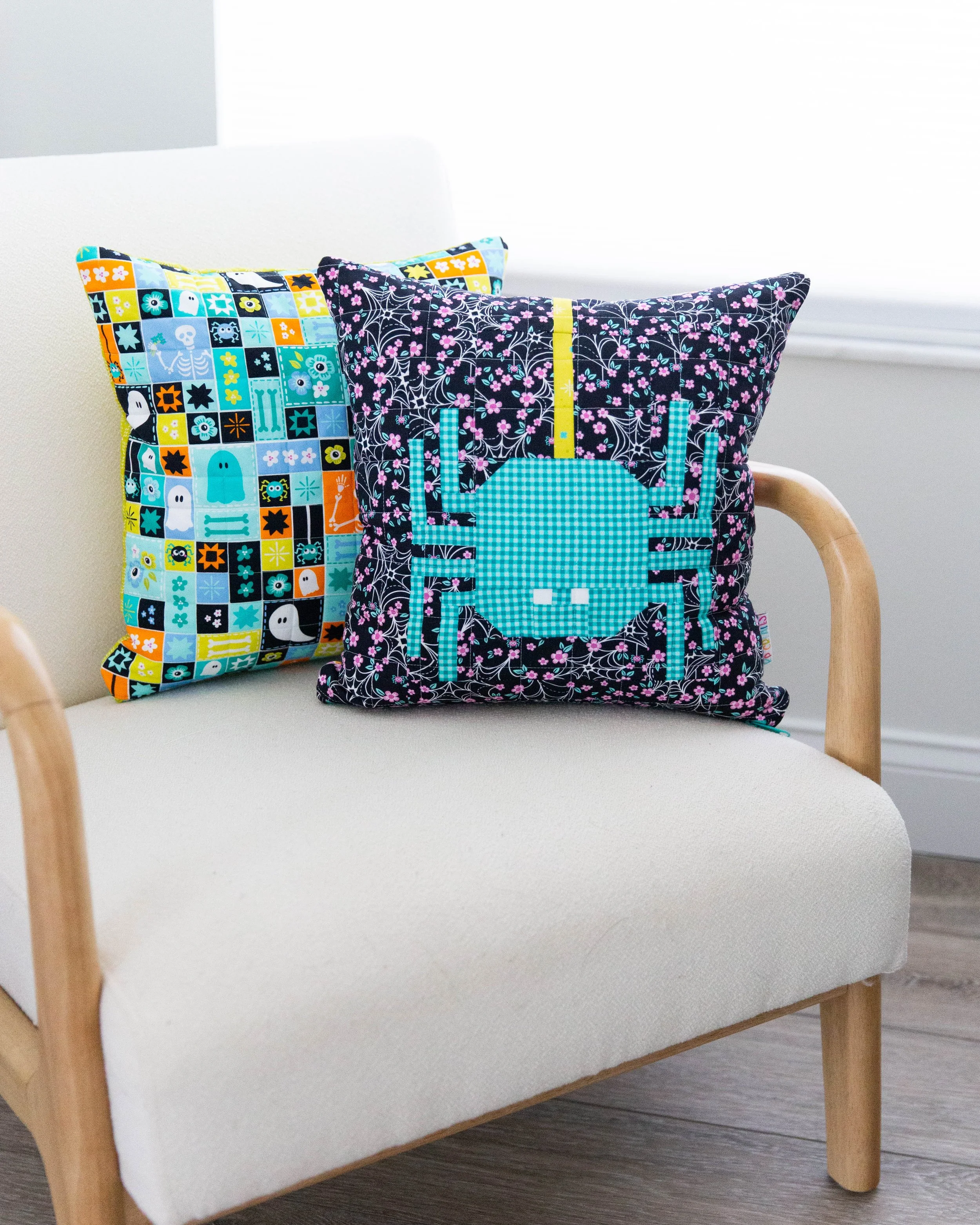 quilted spider pillow made with ghostly garden fabric