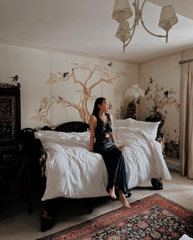 The Master Suite, with its antique opium bed and hand-painted Japanese screens, birds and blossom on every wall. Elegance, as seen through the eyes of the Fashion Director of Vogue Thailand @pookjongkol