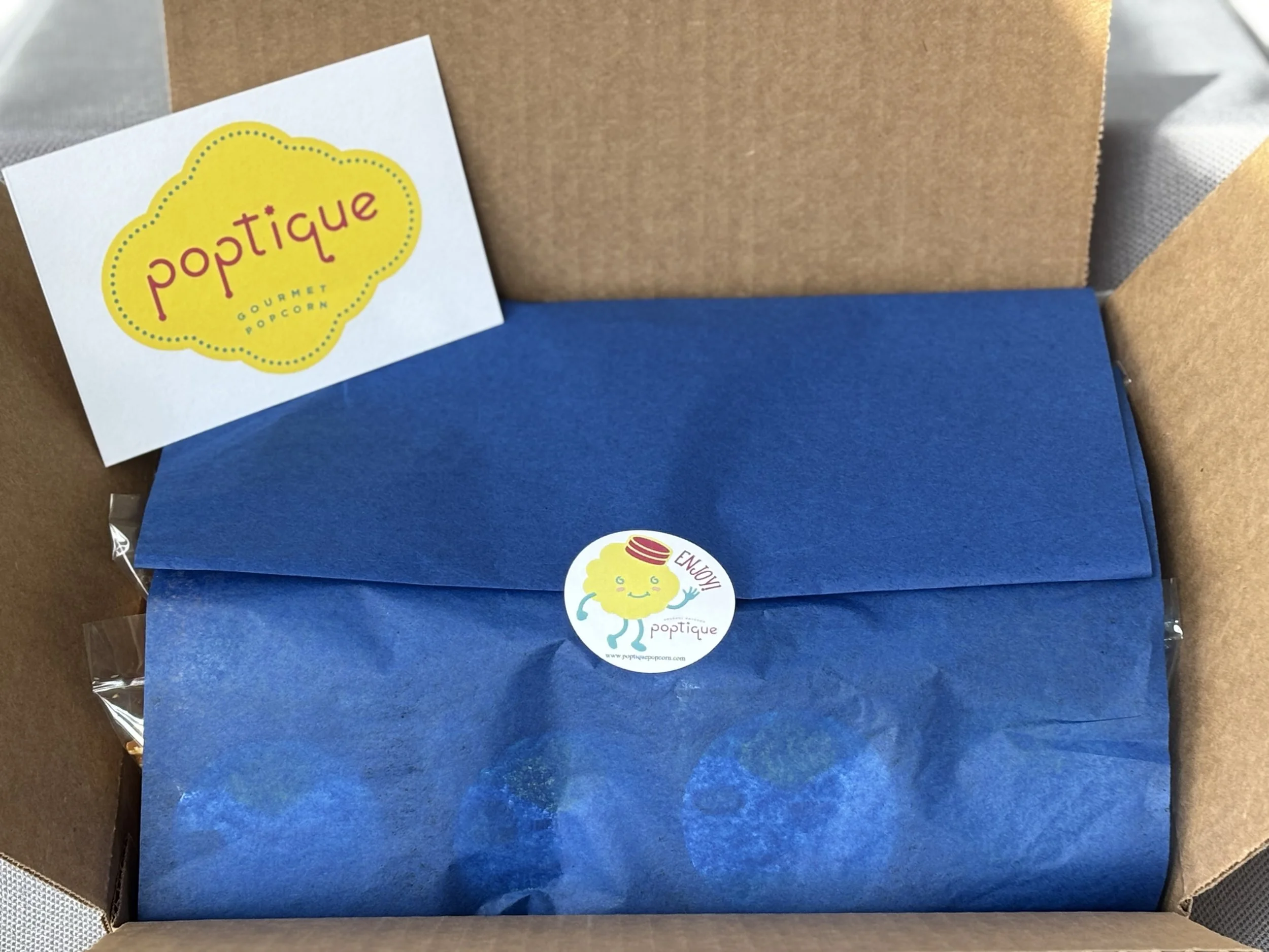 Poptique Sampler Tissue sealed .jpeg
