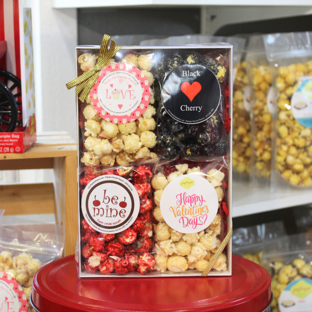 Adorable Valentine Love Sampler with 4 flavors of gourmet popcorn, clear lid display box and ribbon bow