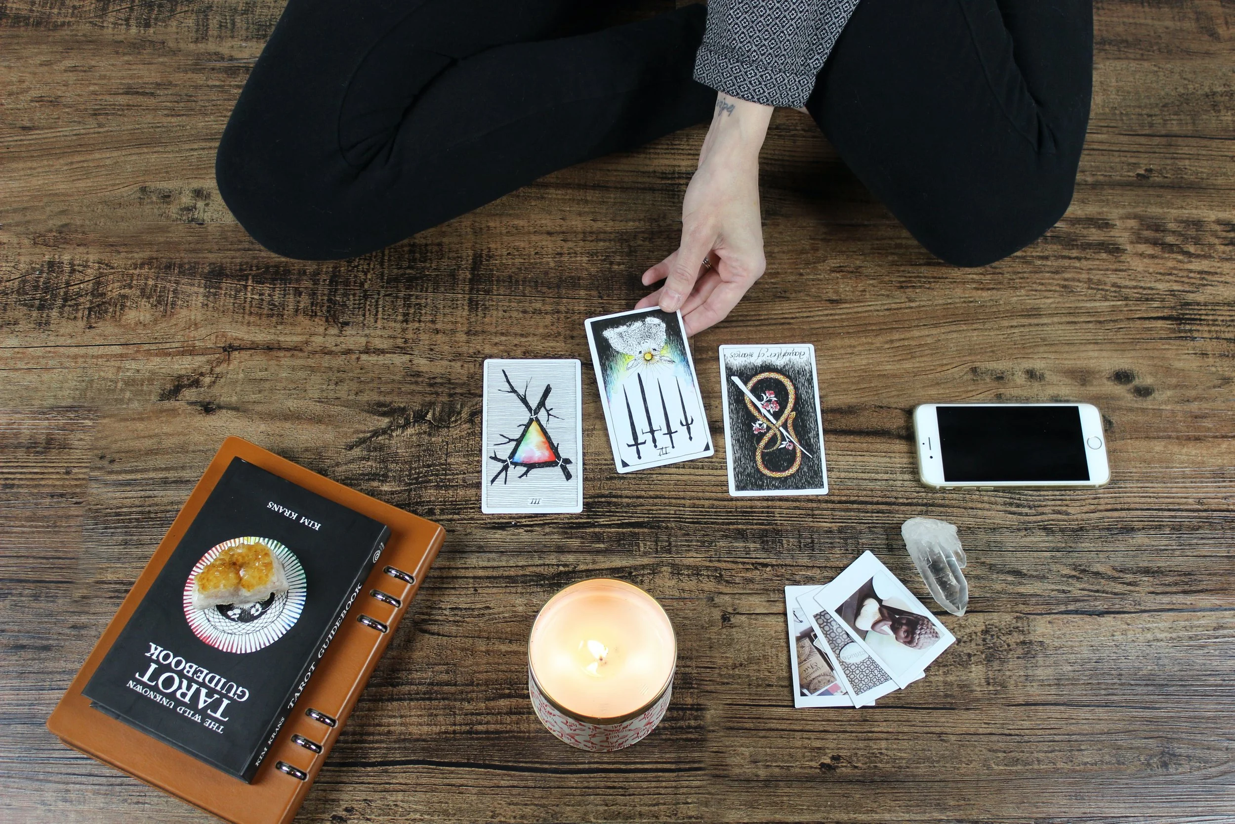 Image showing woman using tarot as a tool for personal growth. Jessika Fruchter LMFT integrates tarot into her therapy practice to support women in accessing their own intuition and psyche.