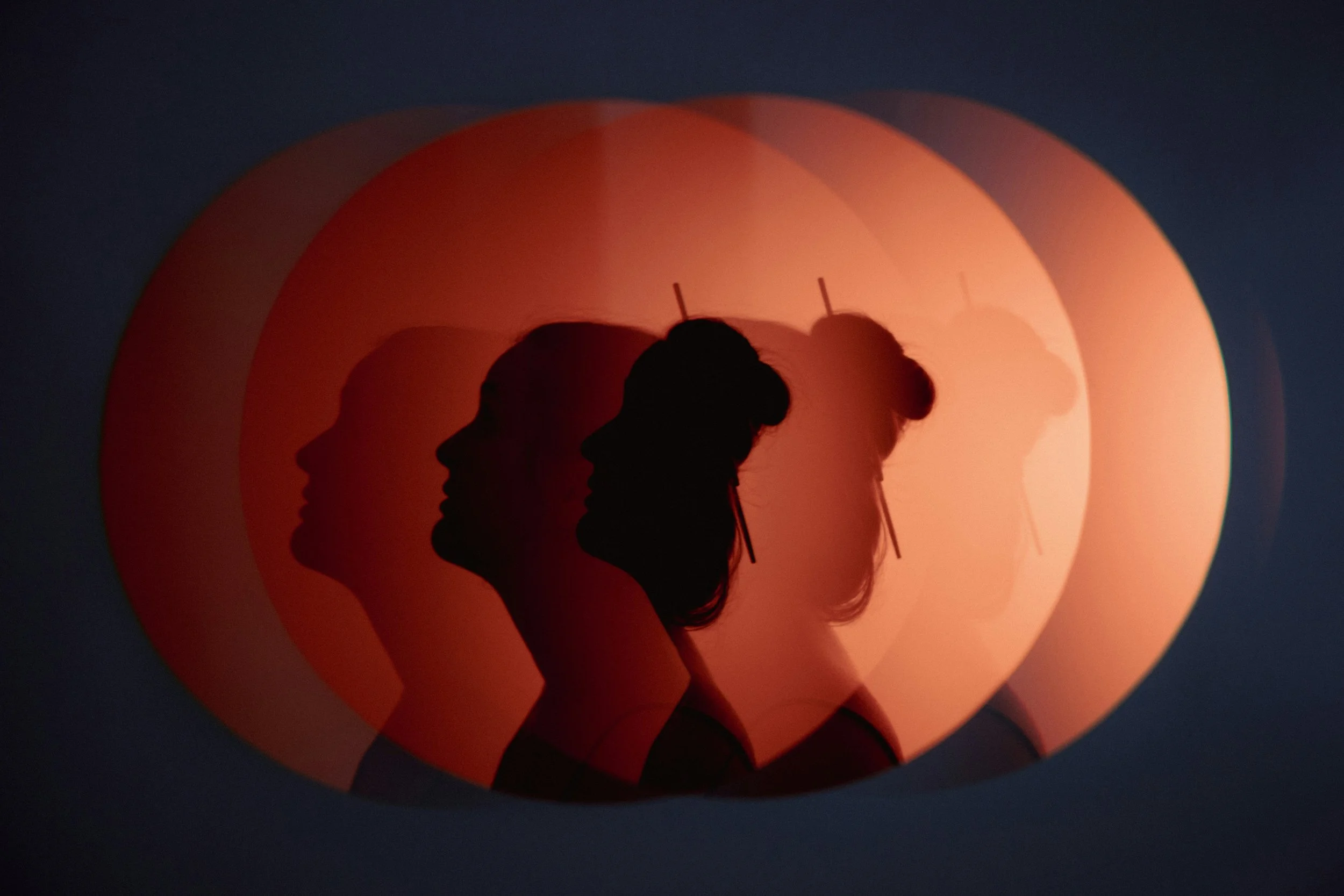 Women's shadow showing the depths of identity in midlife.