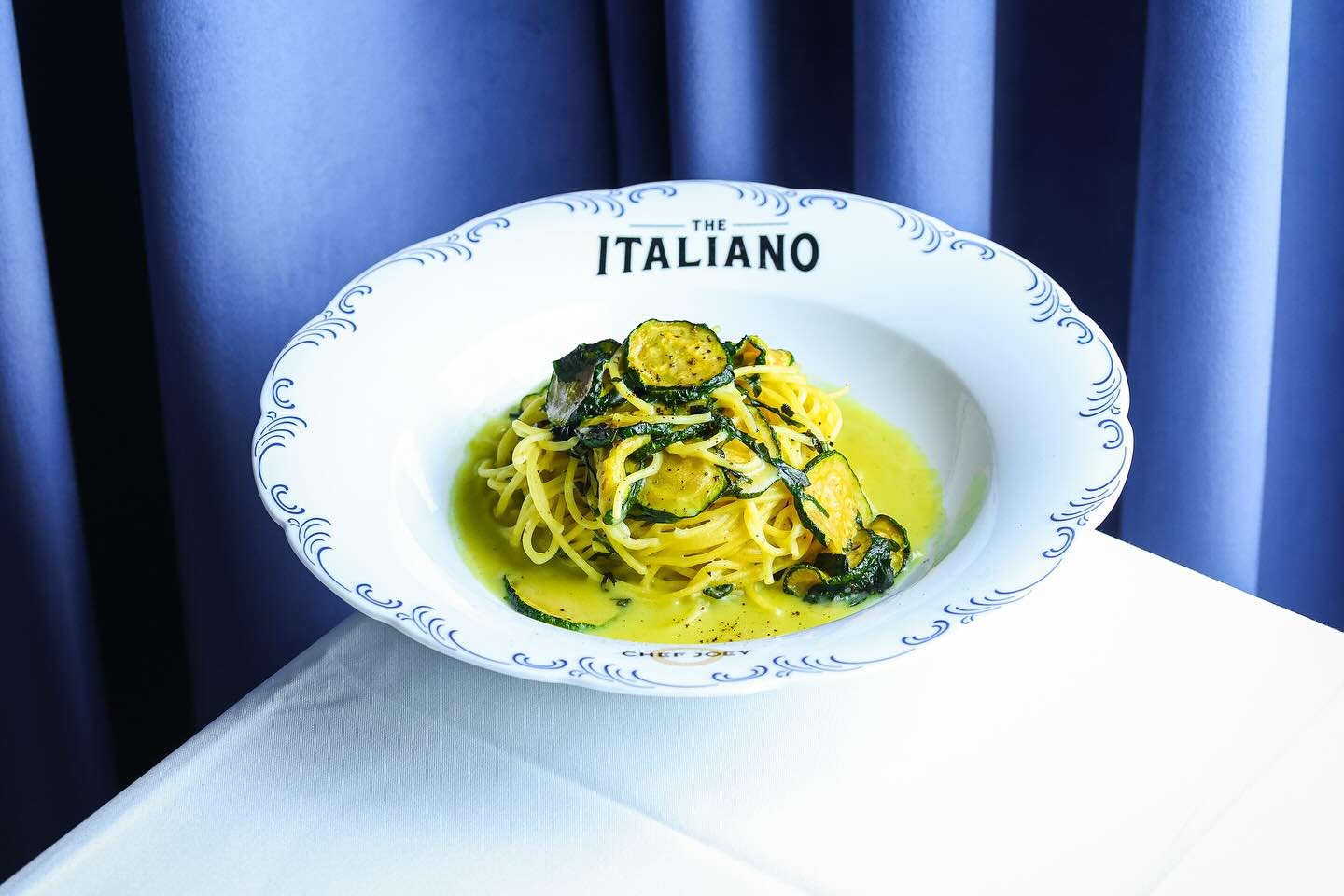 ✨🍝 NEW at The Italiano this summer &mdash; Benito&rsquo;s Spaghetti alla Nerano! 🍝✨

🥒 Crispy fried zucchini
🌿 Fresh basil
🧀 Parmigiano, the perfect finish

Light, fresh, and full of sunshine &mdash; only at The Italiano. Come twirl into summer!
