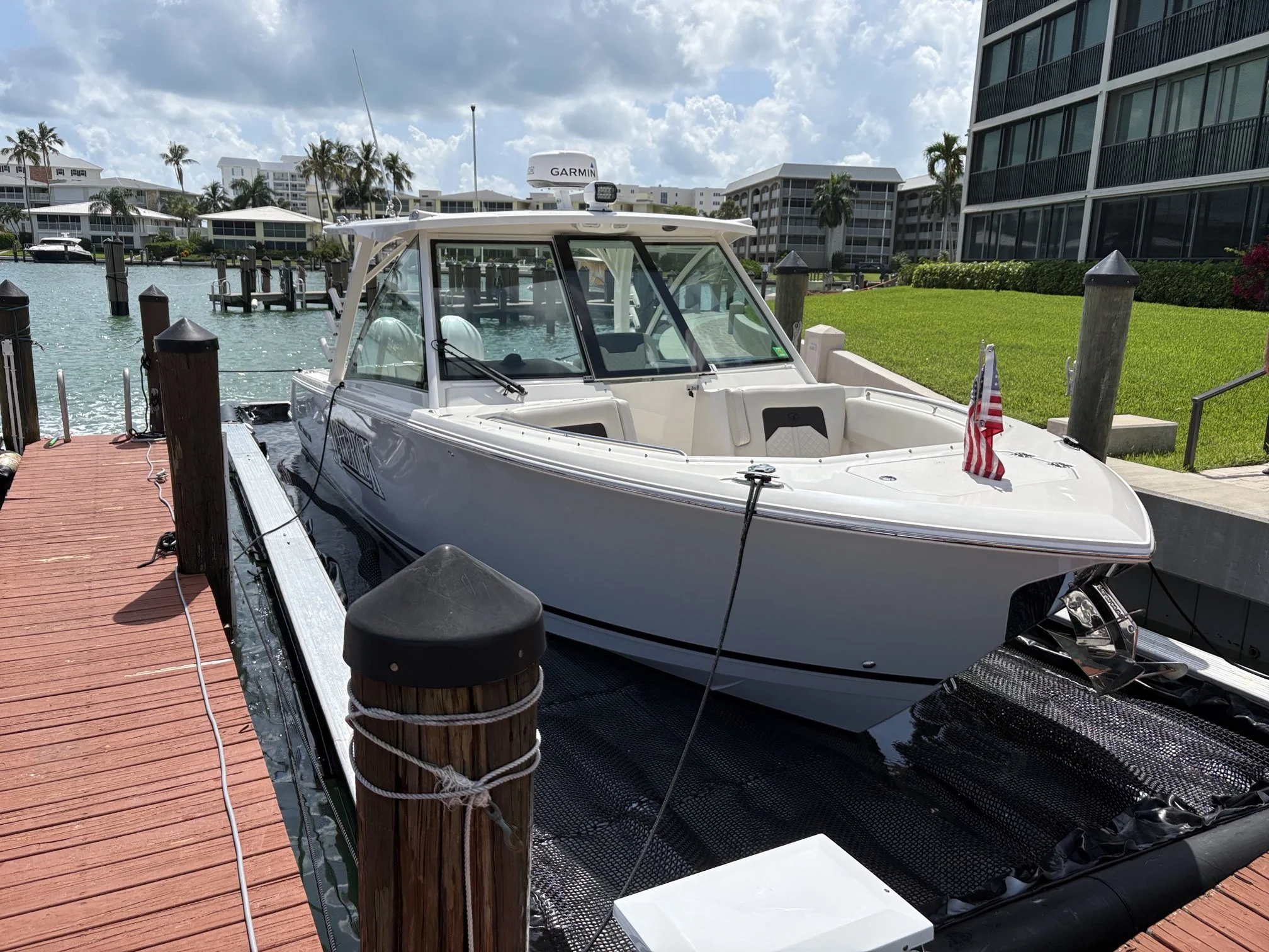 316DC 31' Sailfish in 37x12 Solstice SeaPen, Naples, Florida