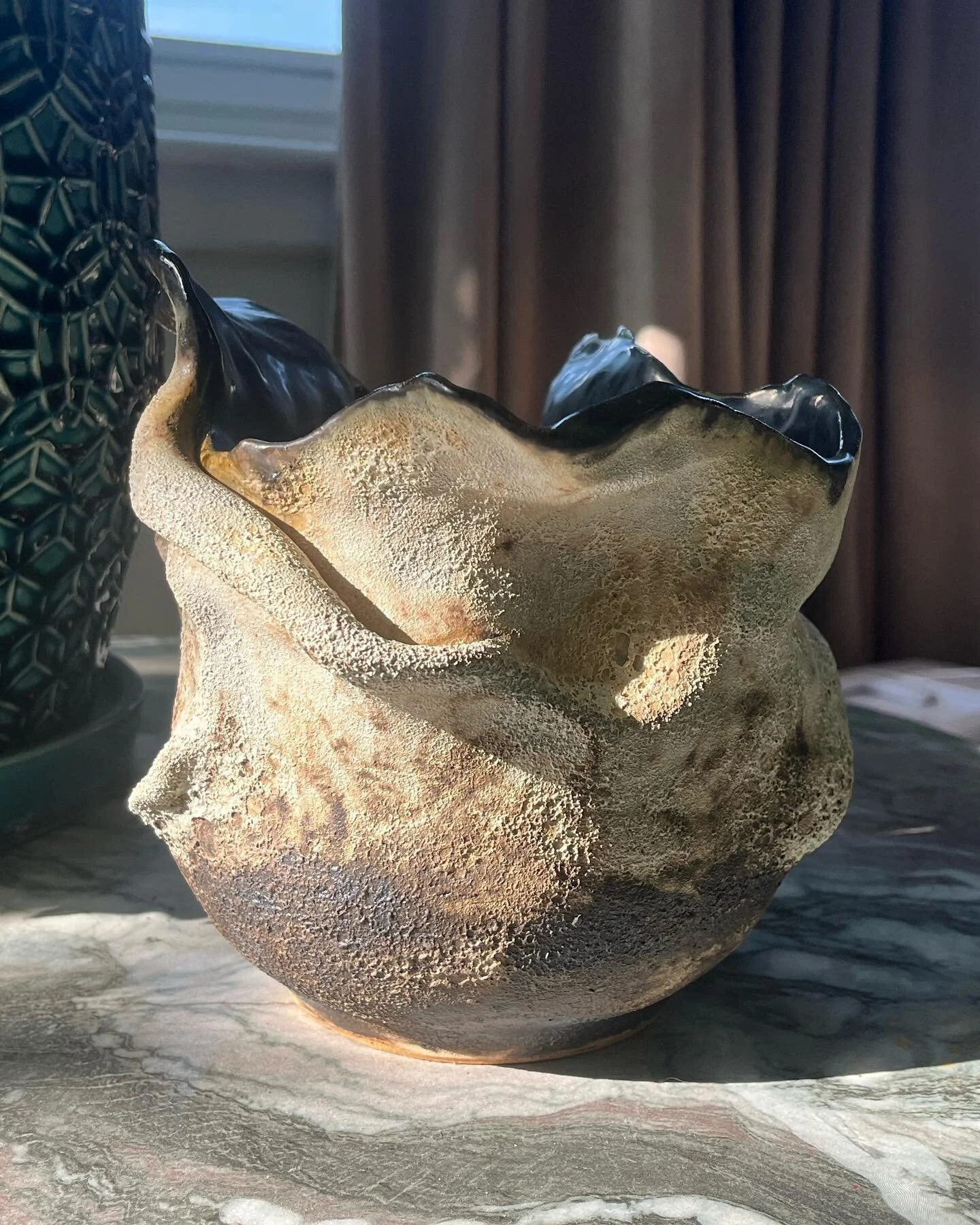 I&rsquo;ve been experimenting with variations and layering of glazes, textures and forms. This vase is both wheel thrown and hand built and has a fluidity that carries throughout. I&rsquo;m quite happy with how the interior turned out as well. It has