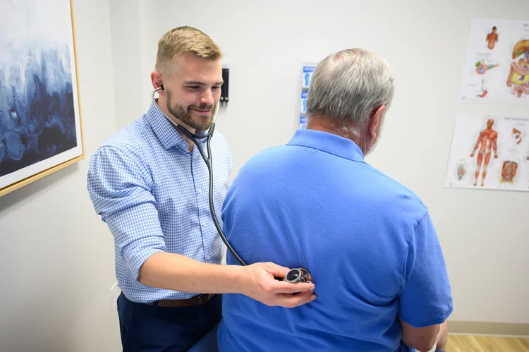 Summit doctor with adult patient