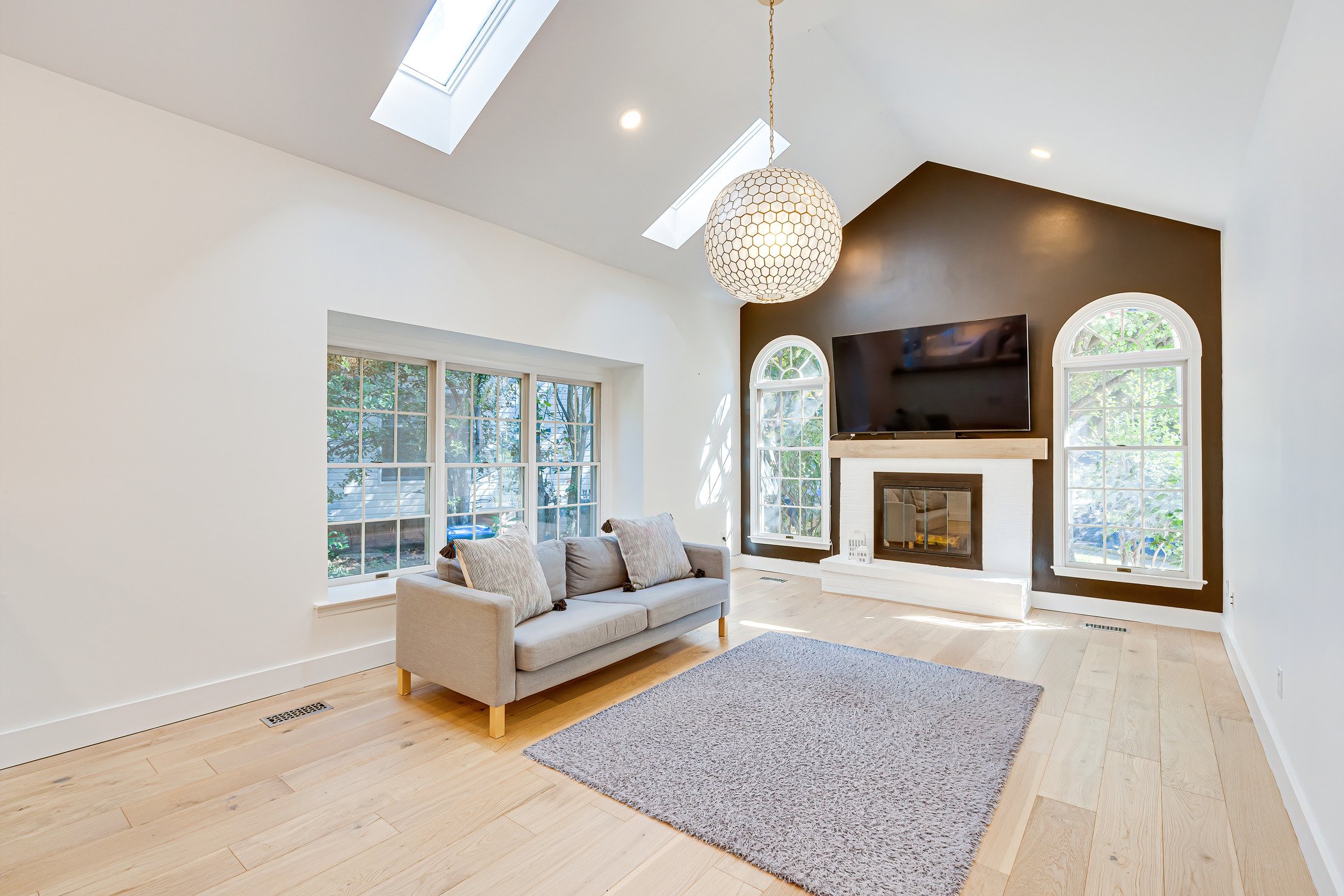 new-living-room-grey-sofa-and-round-chandelier- (1).jpg