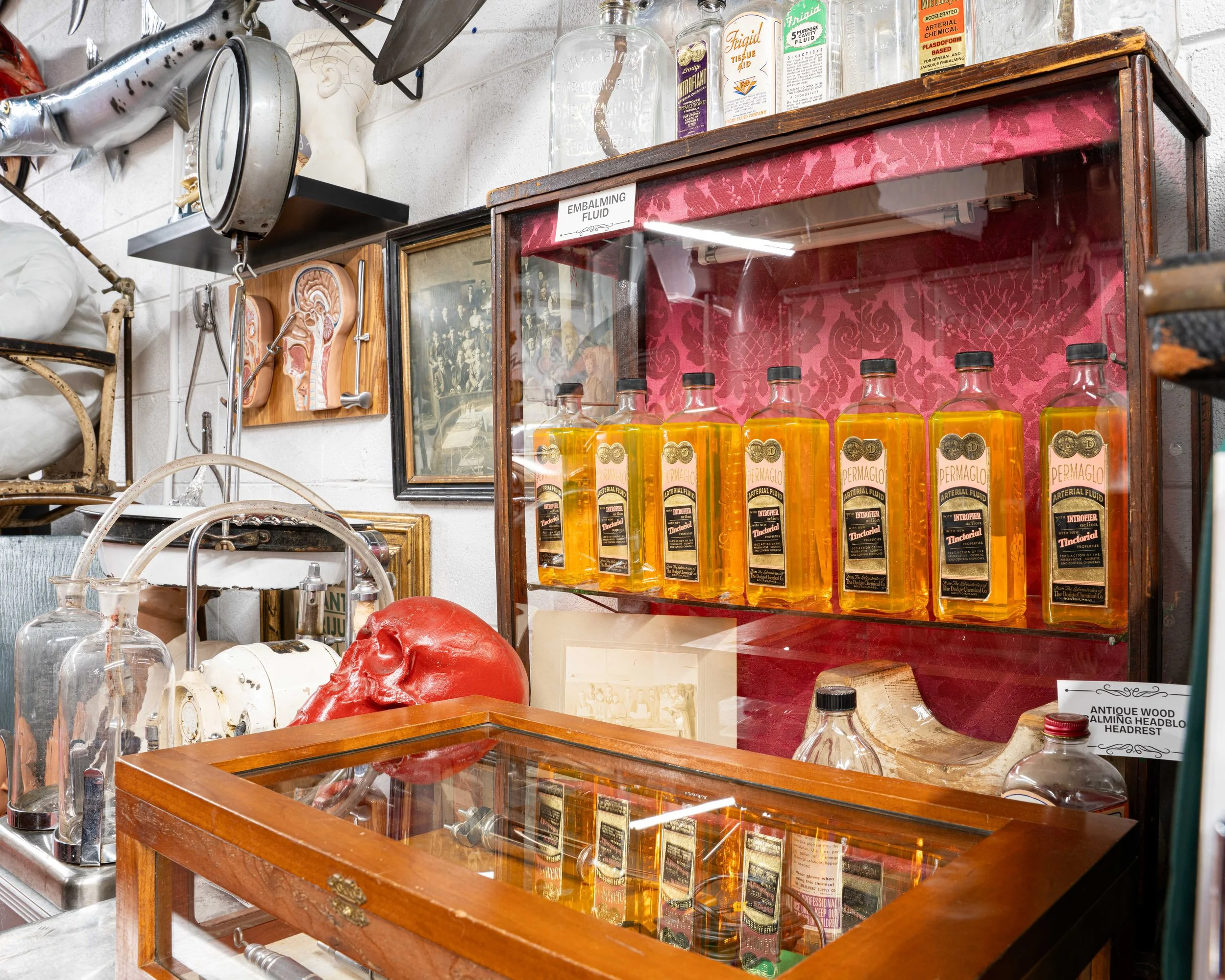 We have a huge variety of antique medical equipment. Pictured is a rack of embalming fluid