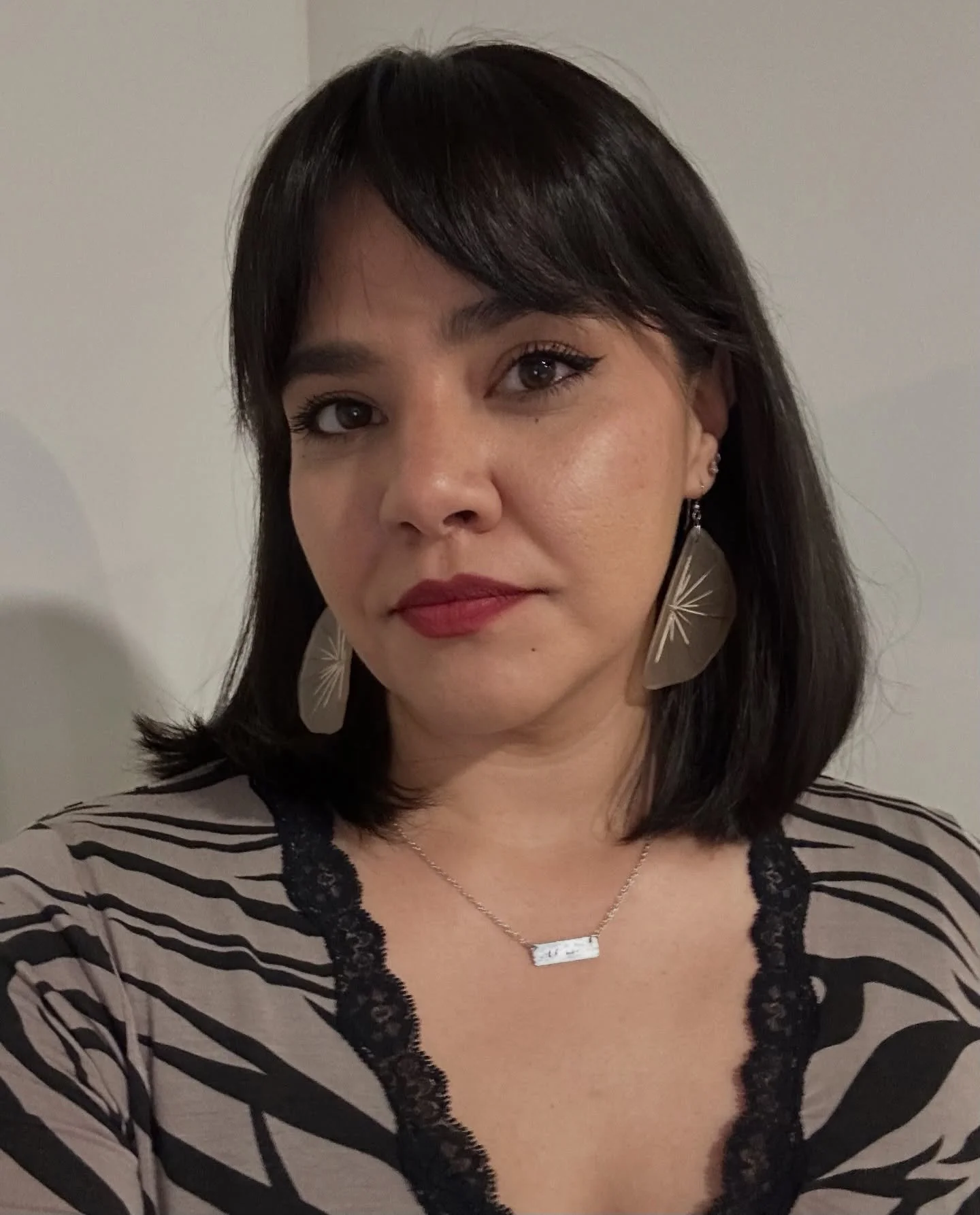 Just an Aquarius that celebrated her birthday yesterday 🪶 

&mdash;
Cheers to surviving another year. 
Taking on 2026 one day at a time. 

&mdash;
Blooming Quill Earrings by Tashina Lee Emery. 🤍