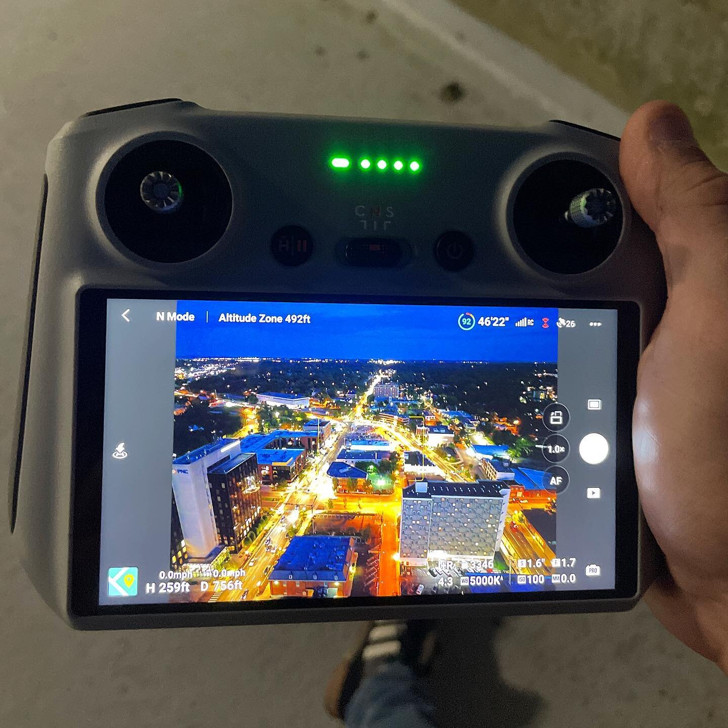 Shooting drone clips of the city lights for a promo video. Link in the bio