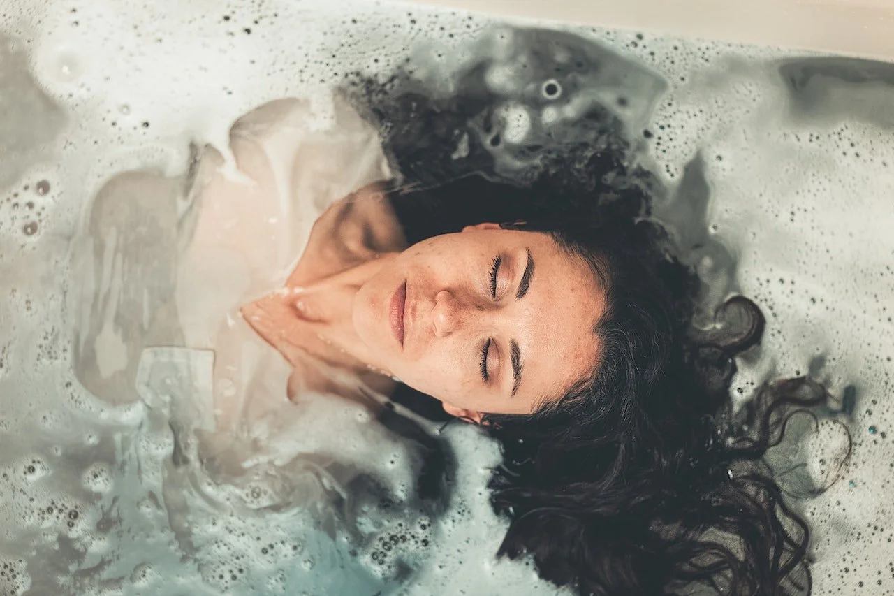 lying back in bath tub