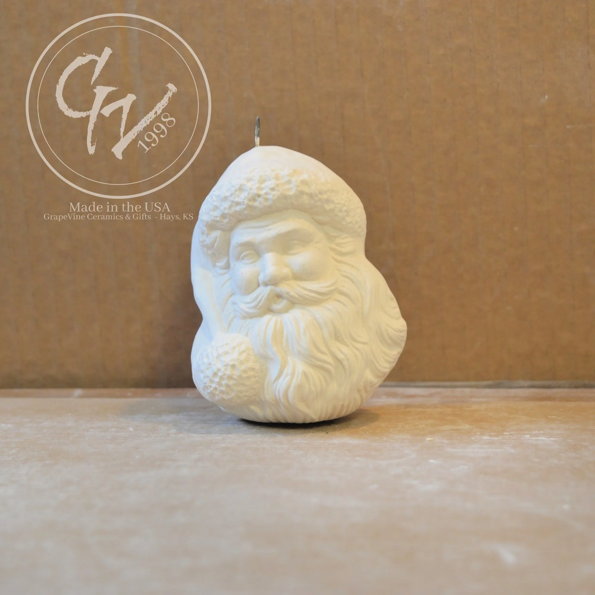 Hand-poured Santa Head ceramic ornament ready to paint