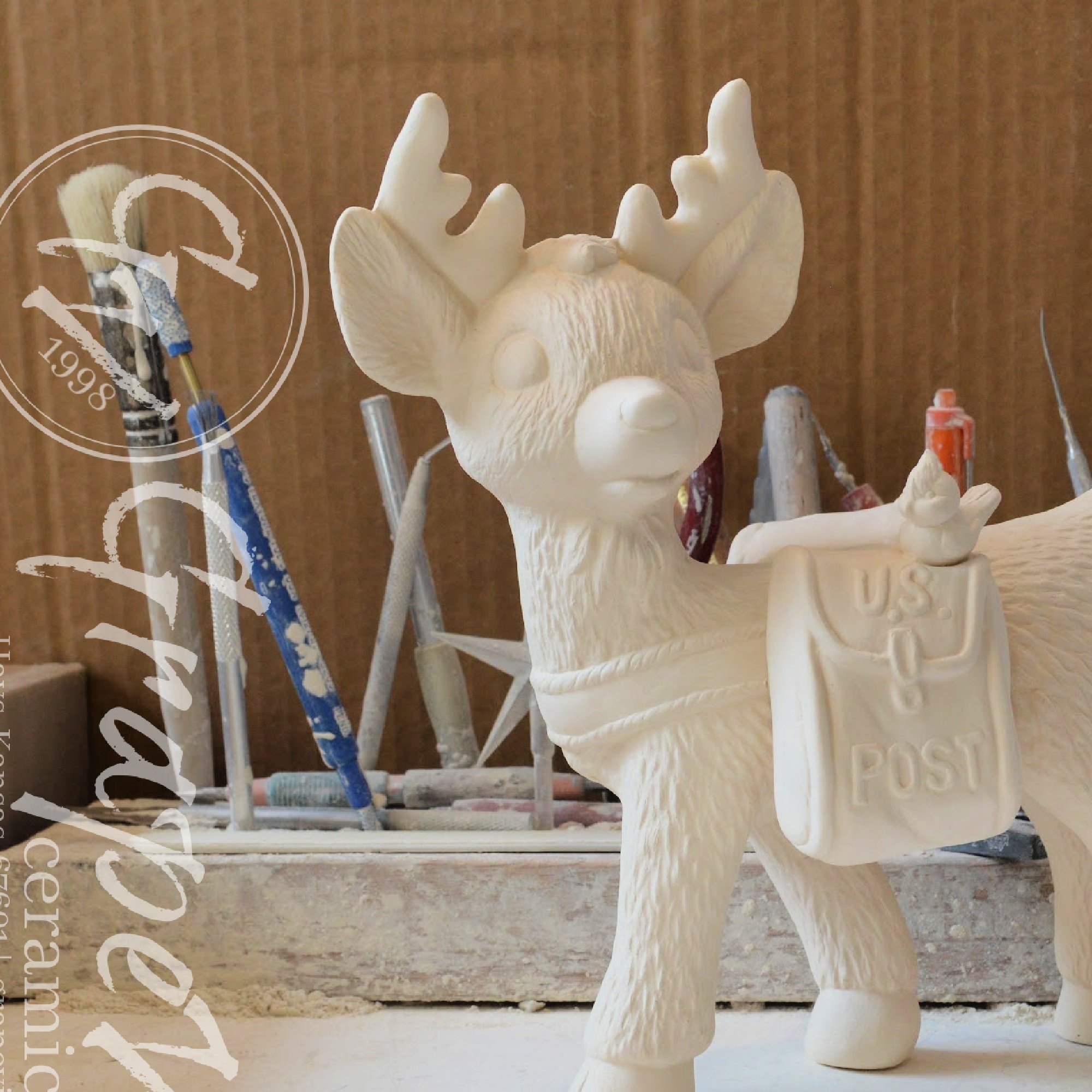 Close up of Unpainted Reindeer Postman ceramic figurine – Kimple mold