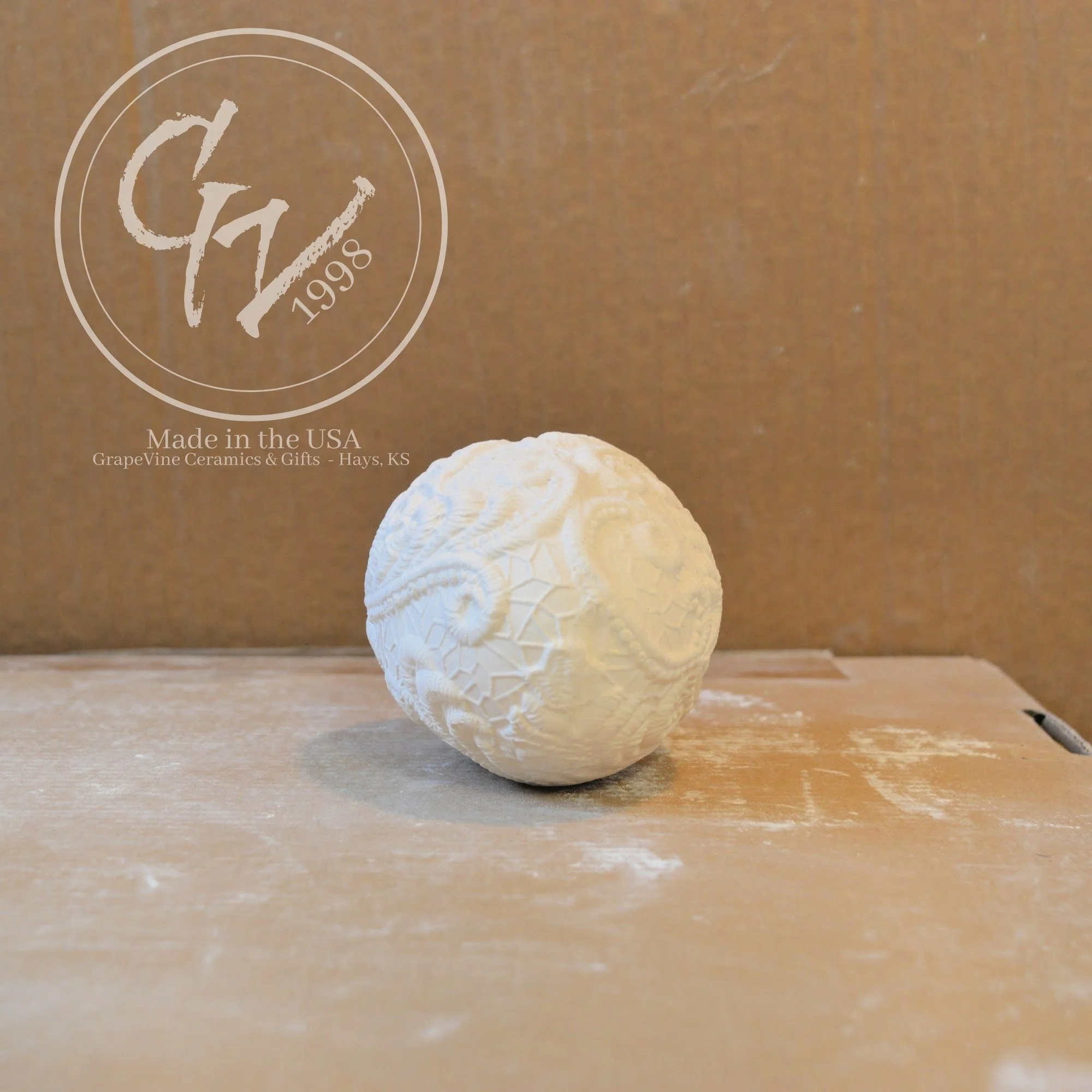 Unfinished ceramic resting lace duck egg ready for acrylic paint, glaze, or ceramic staining