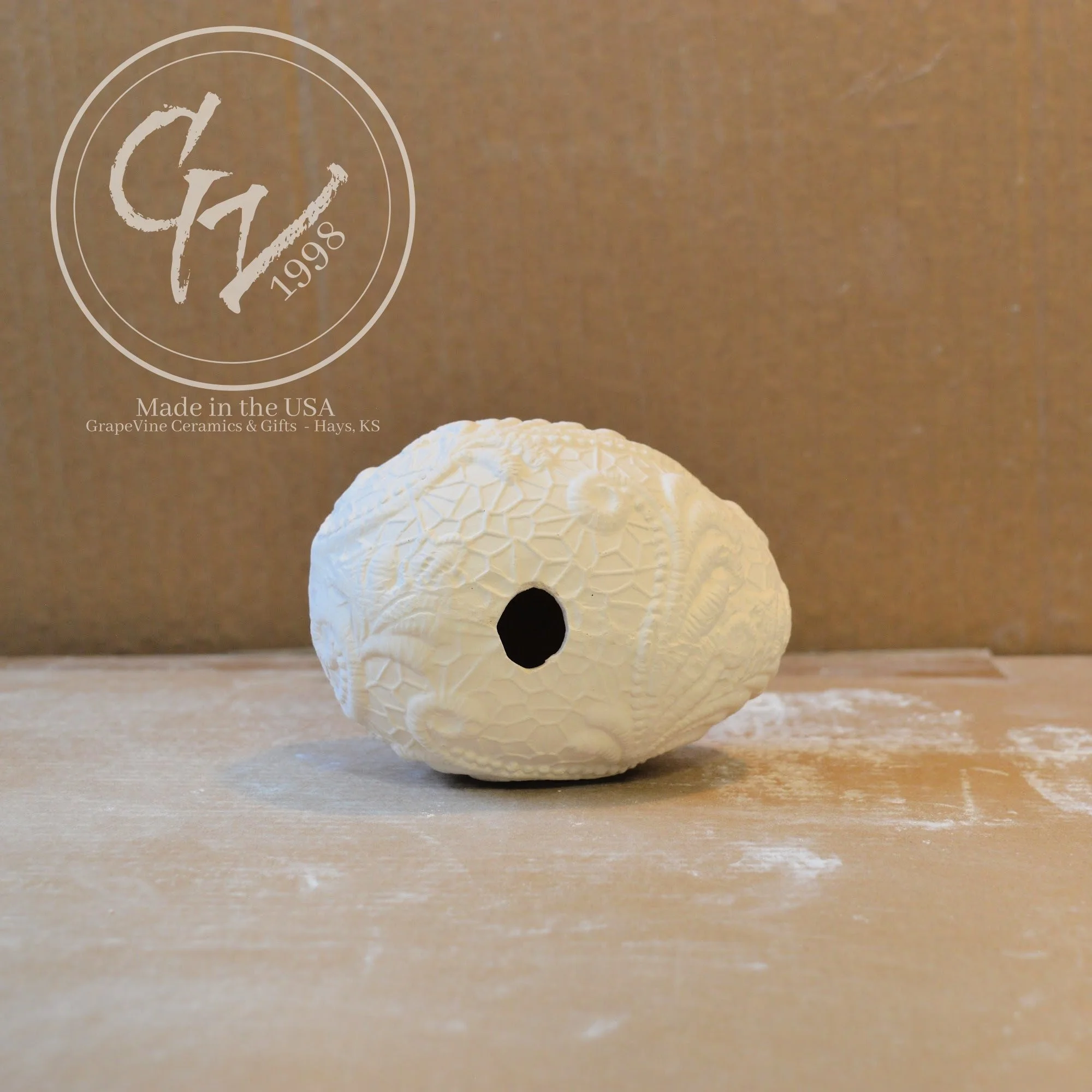 Bottom of Unfinished ceramic resting lace duck egg ready for acrylic paint, glaze, or ceramic staining