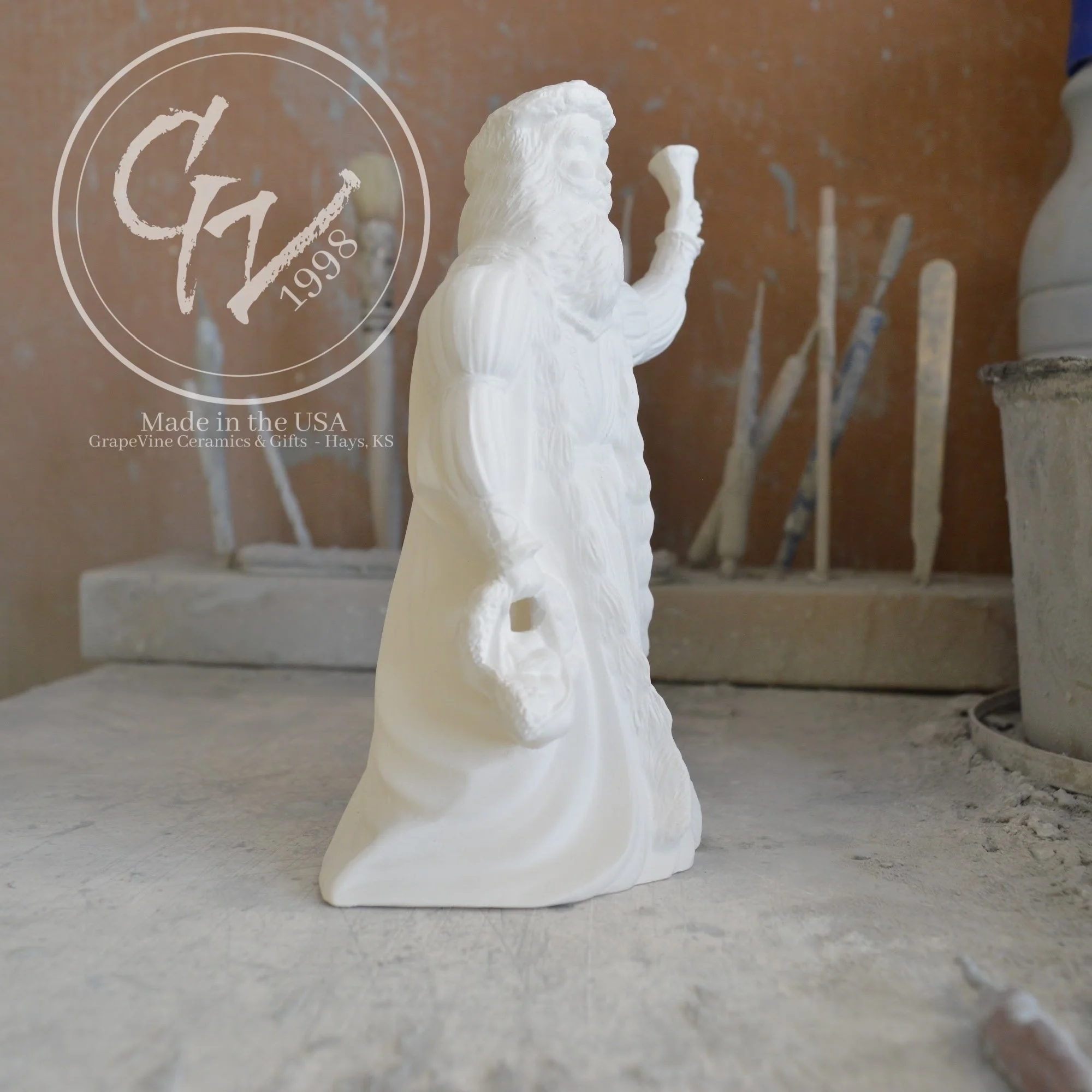 Profile view of a handcrafted English Santa ceramic mold showing the depth and quality of the casting.