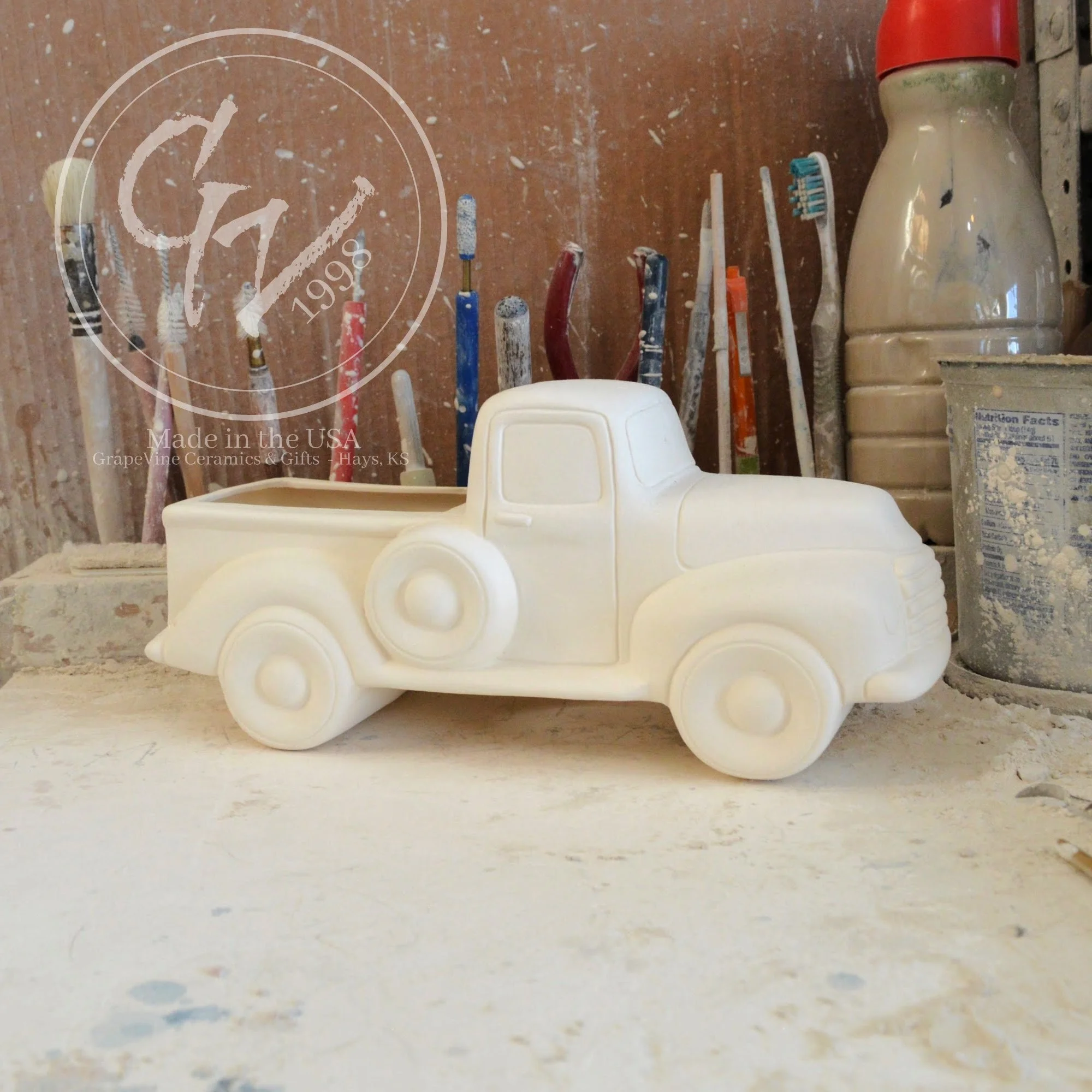 Close-up of the smooth, professionally cleaned surface of the Clay Magic 4102 ceramic truck.