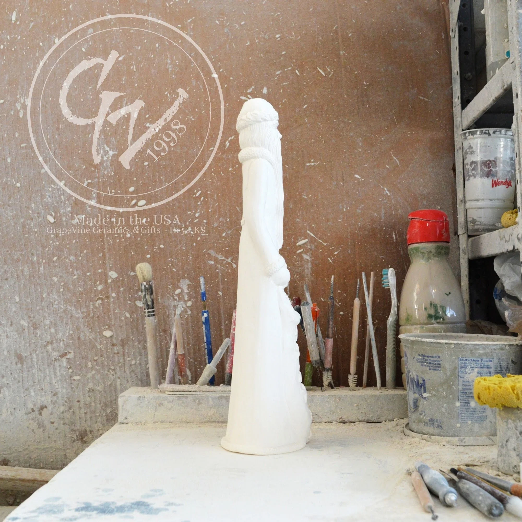 Right facing side view of the unpainted white ceramic bisque Scioto S-2272 Thin Santa with Stars, 16 inches tall, professionally cleaned and ready to paint