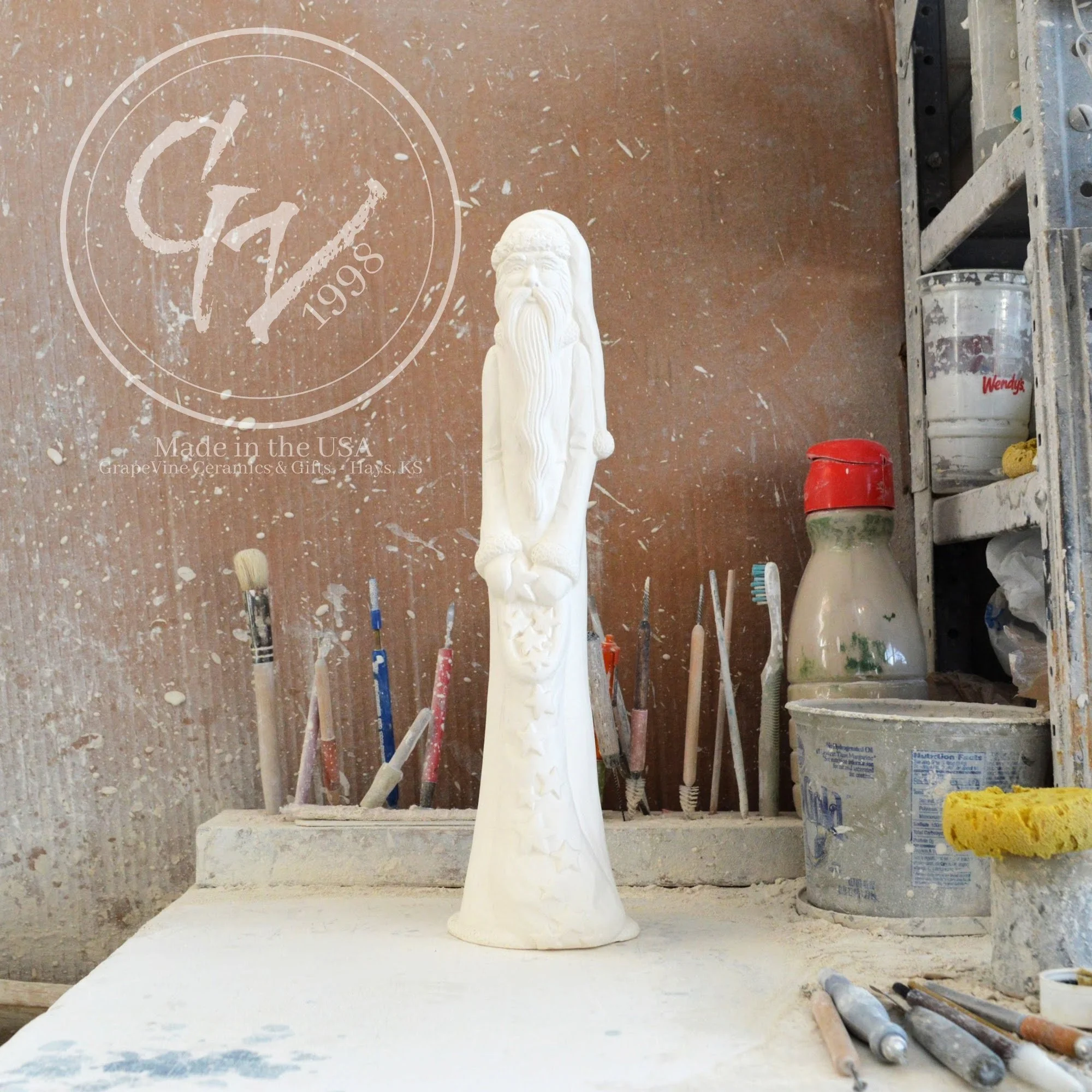 Front view of the unpainted white ceramic bisque Scioto S-2272 Thin Santa with Stars, 16 inches tall, professionally cleaned and ready to paint.