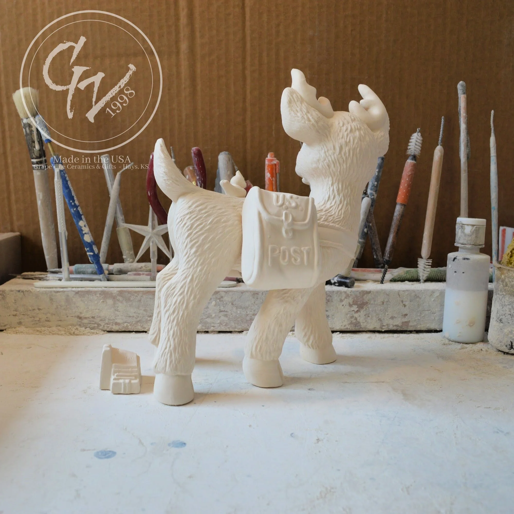 Rear view of Hand‑poured unpainted Christmas reindeer figurine for painting